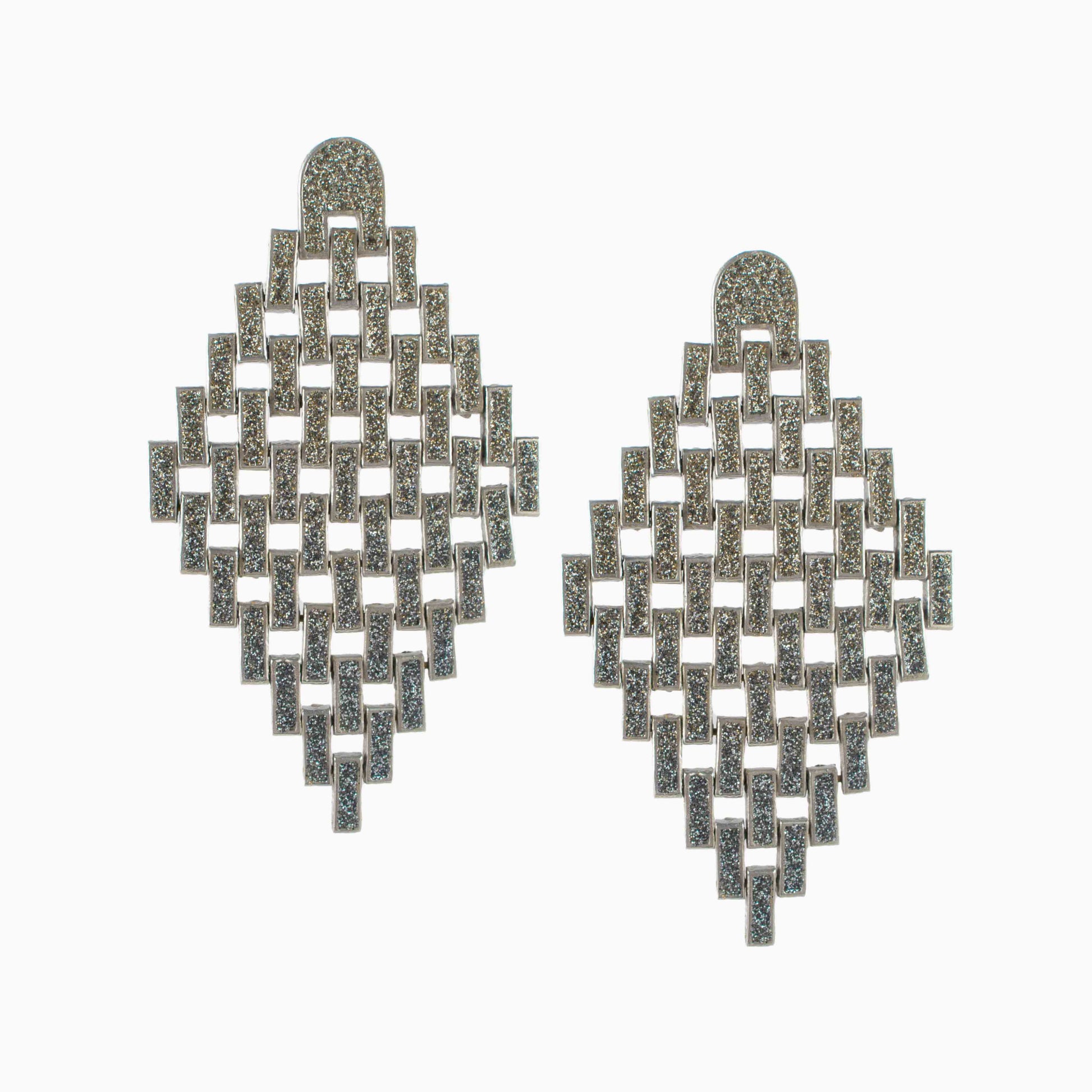 Pair of geometric earrings on a white background