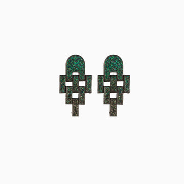 Pair of green geometric earrings on a white background