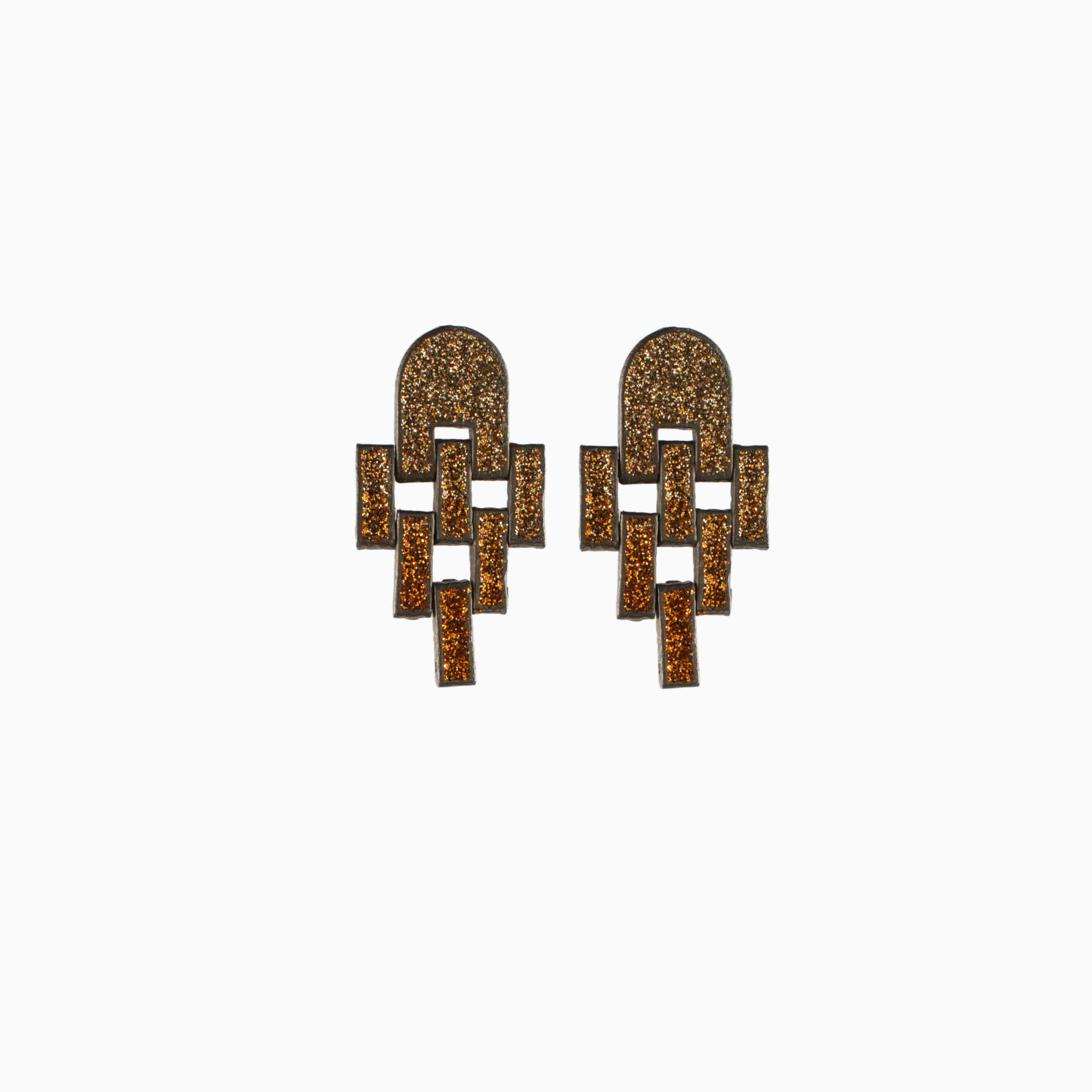 Pair of earrings with geometric design on a white background