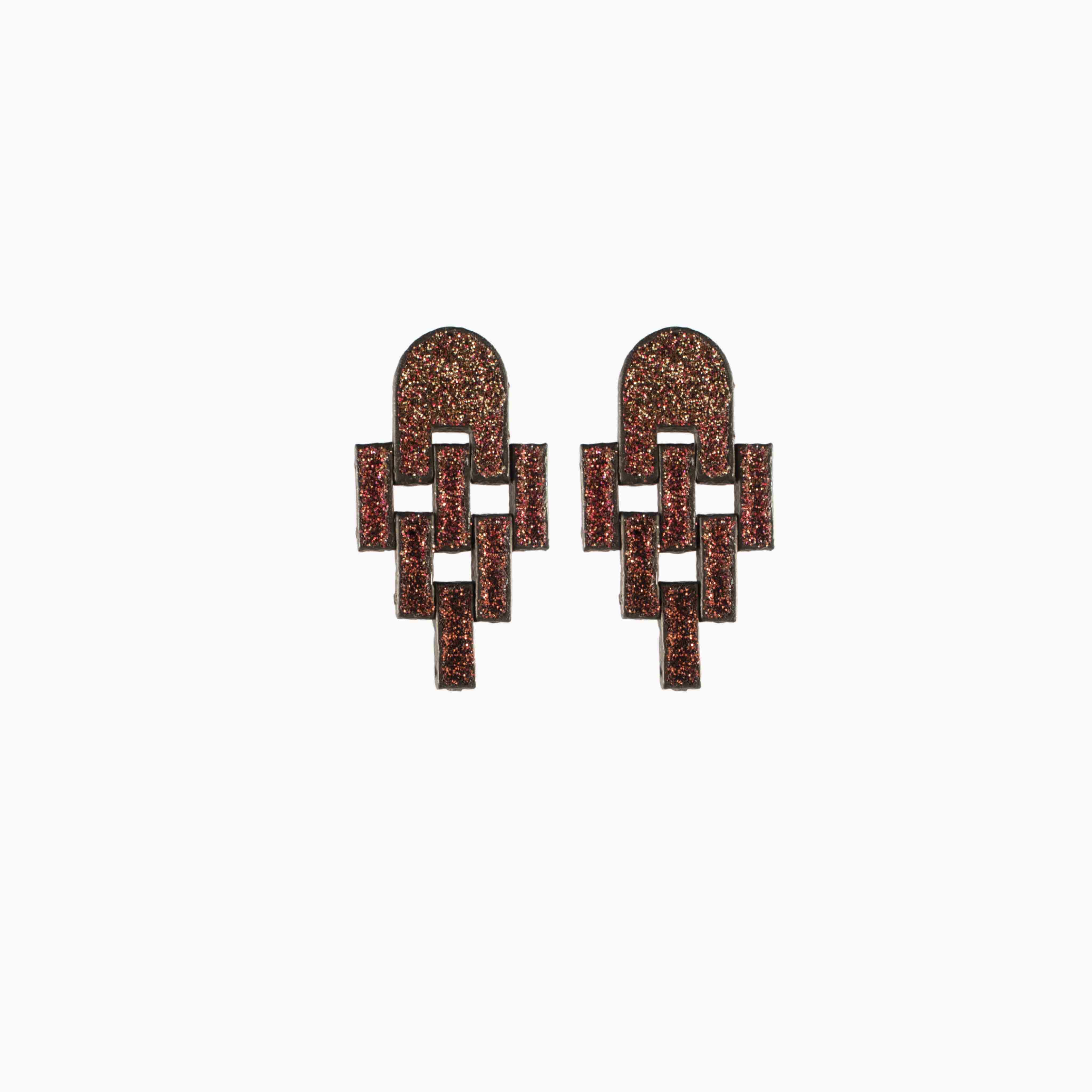 Pair of geometric earrings on a white background