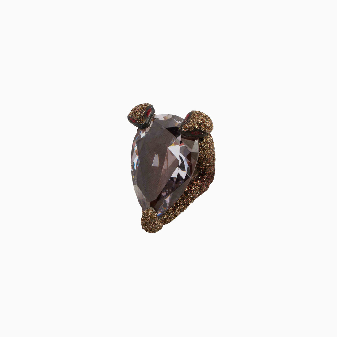 Heart-shaped brown gemstone with gold setting on a white background