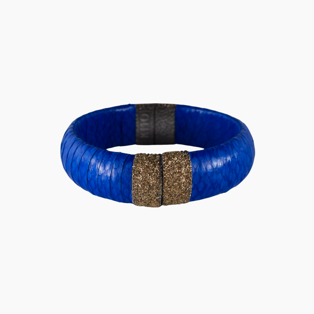 Blue bracelet with a gold accent on a white background