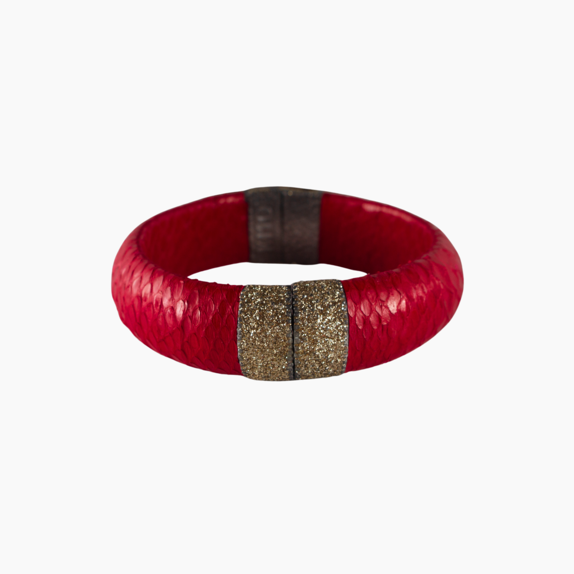 Red bracelet with a gold accent on a white background