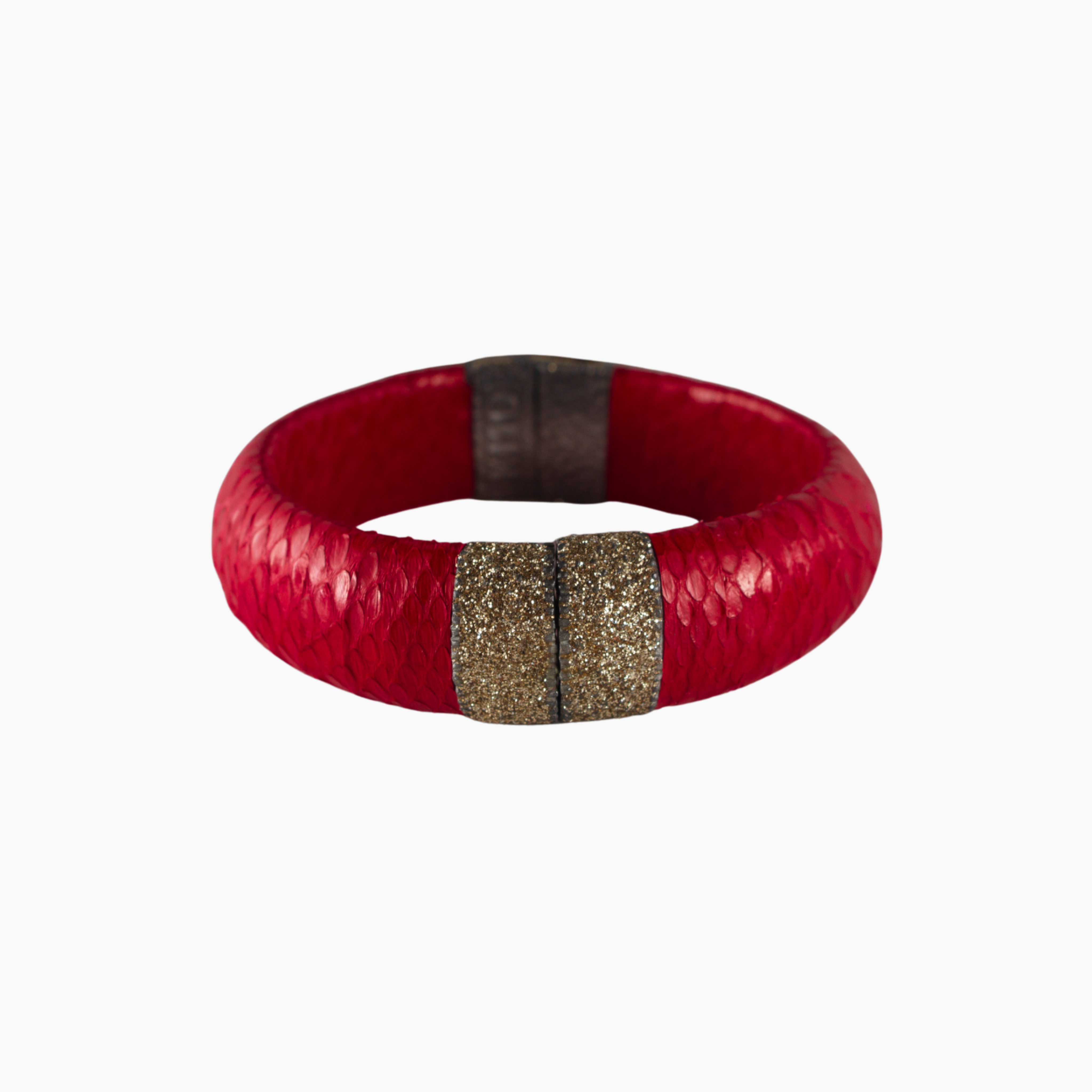 Red bracelet with a gold accent on a white background