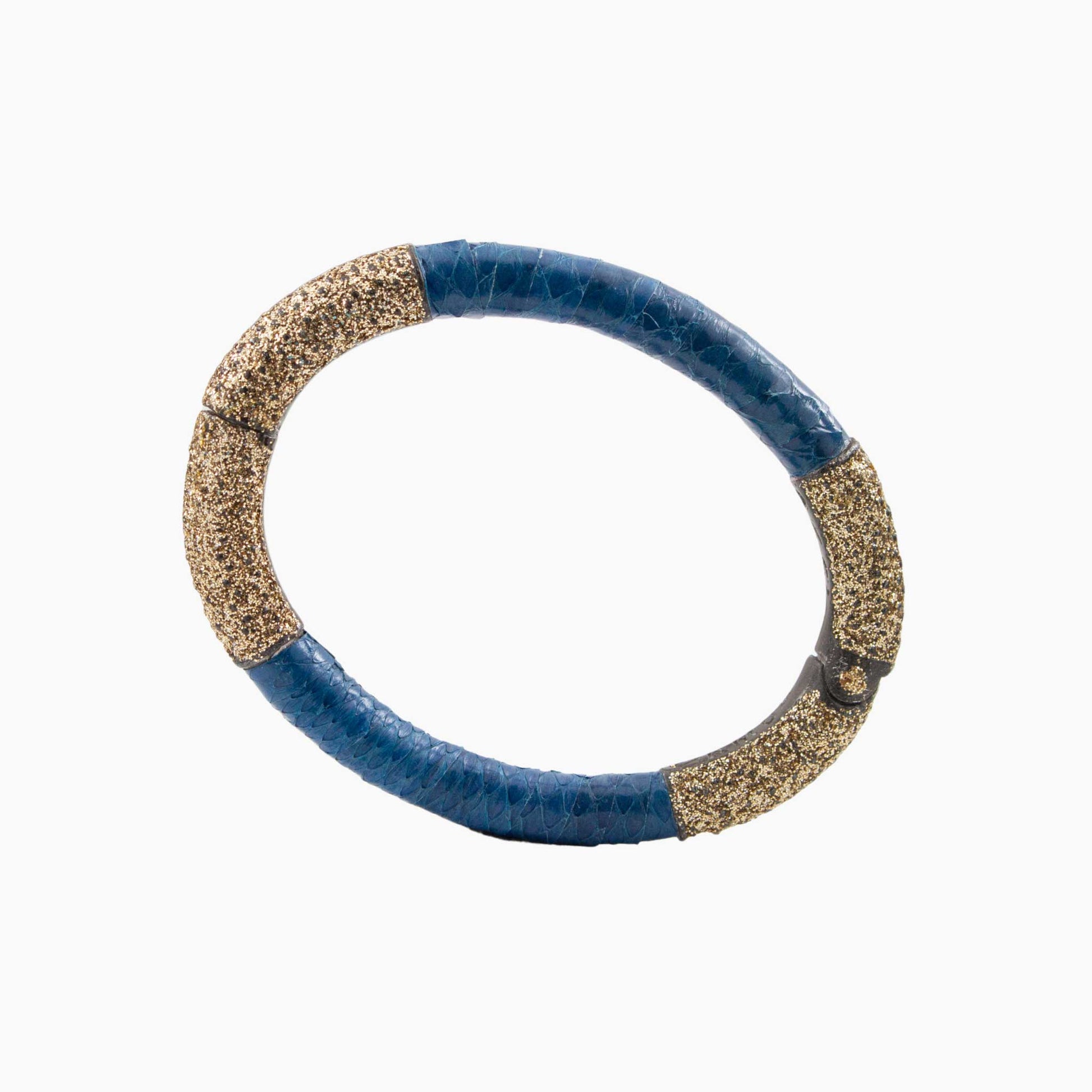 Blue and gold bracelet on a white background