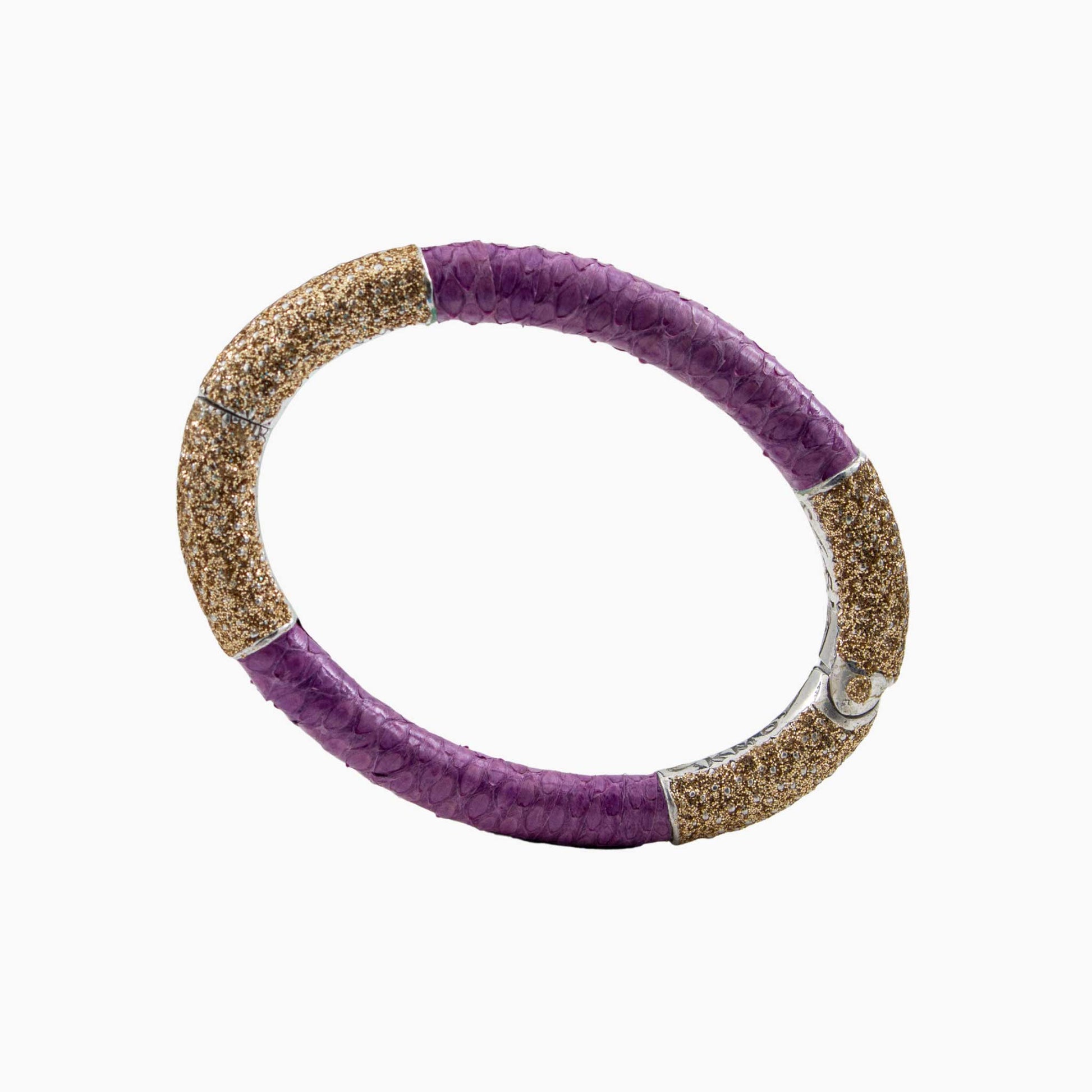 Bracelet with purple and gold band on a white background