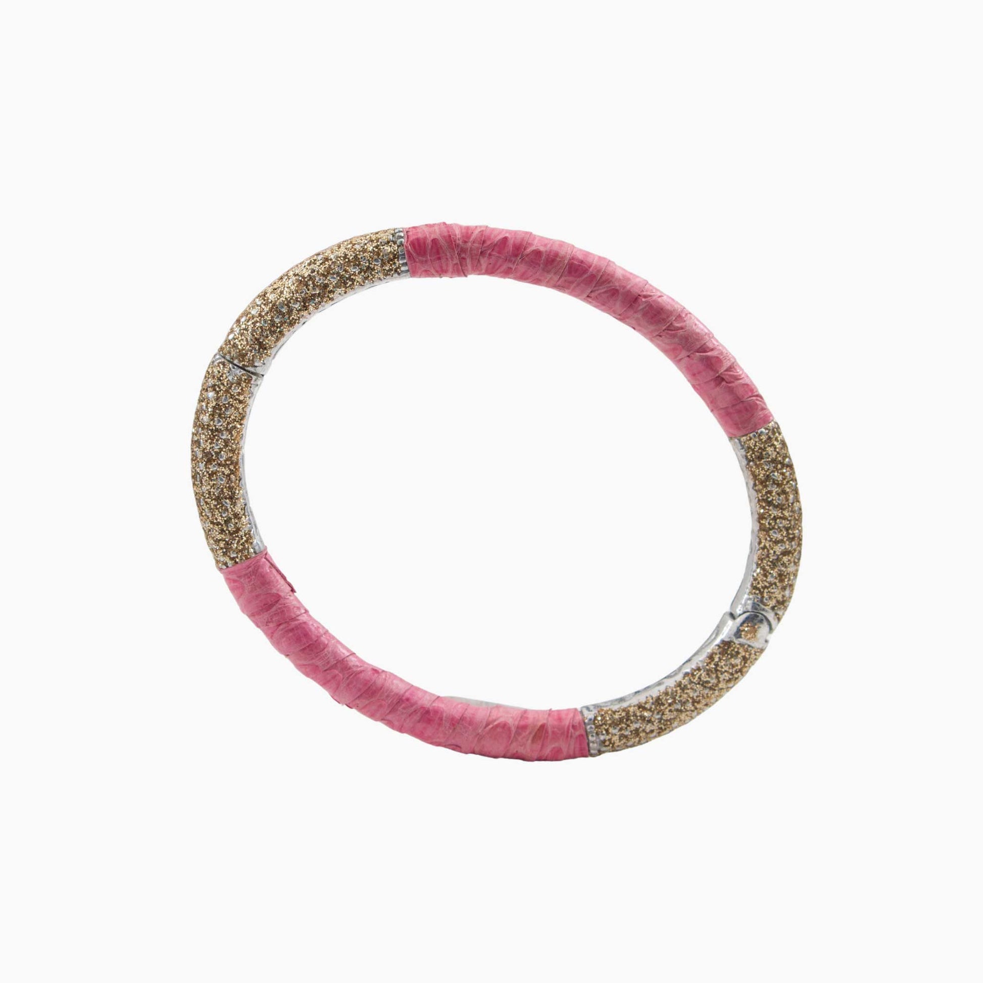 Pink and gold bangle on a white background
