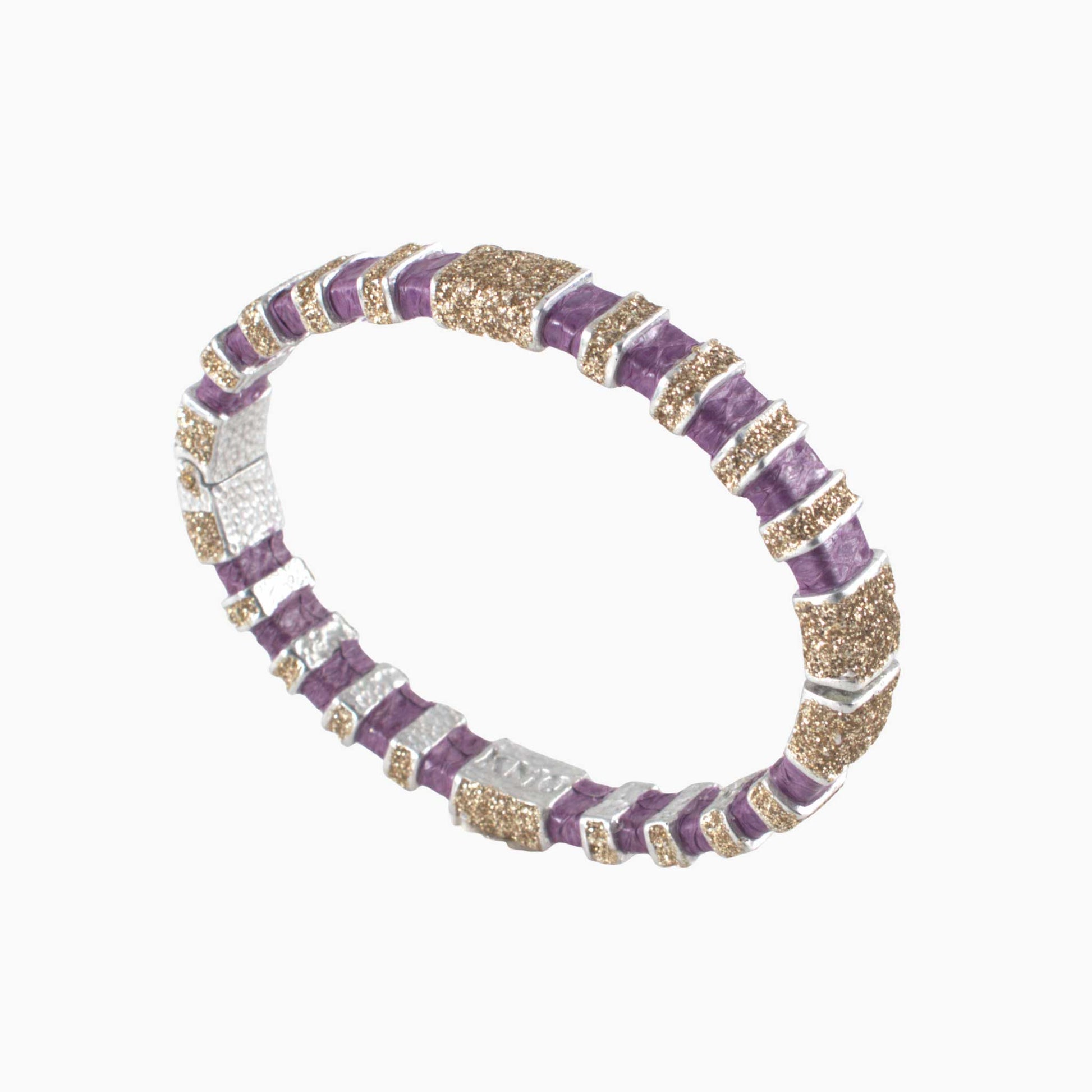 Bracelet with purple, gold, and silver beads on a white background