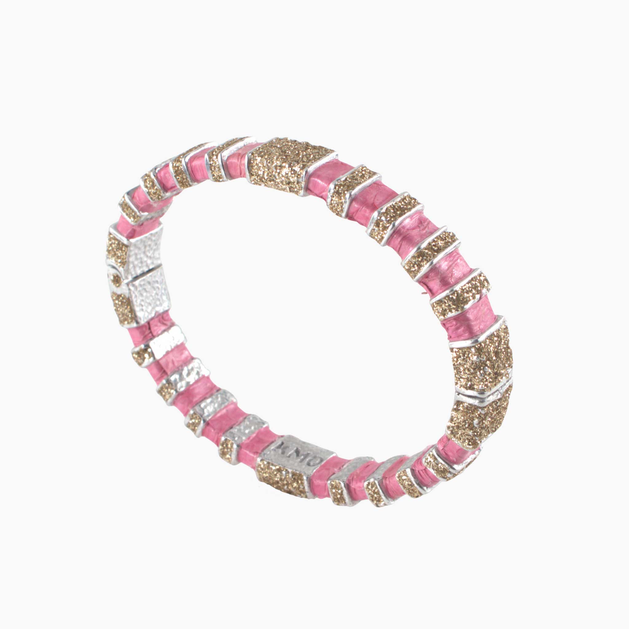 Bracelet with pink, gold, and silver stripes on a white background