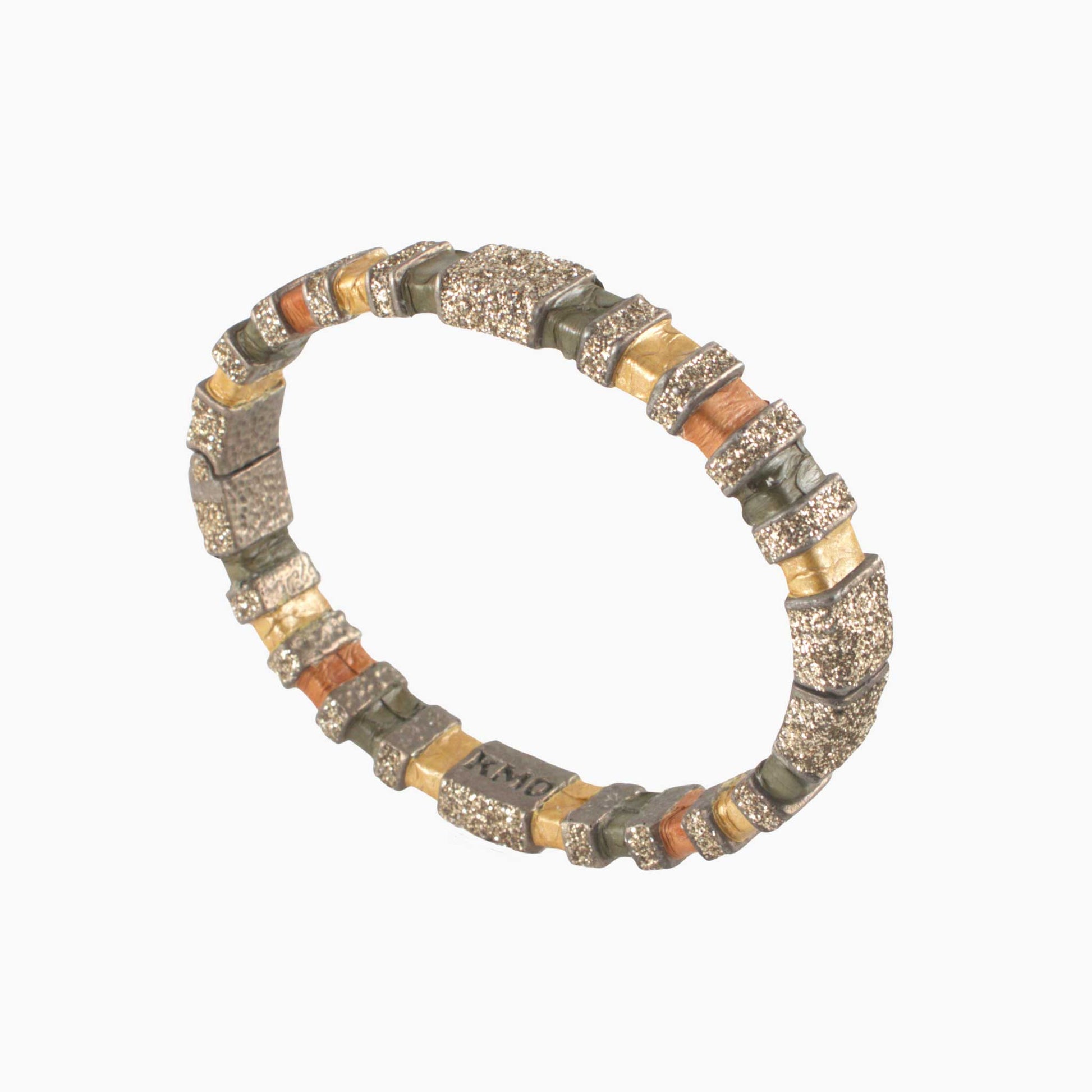 Bracelet with metallic beads on a white background