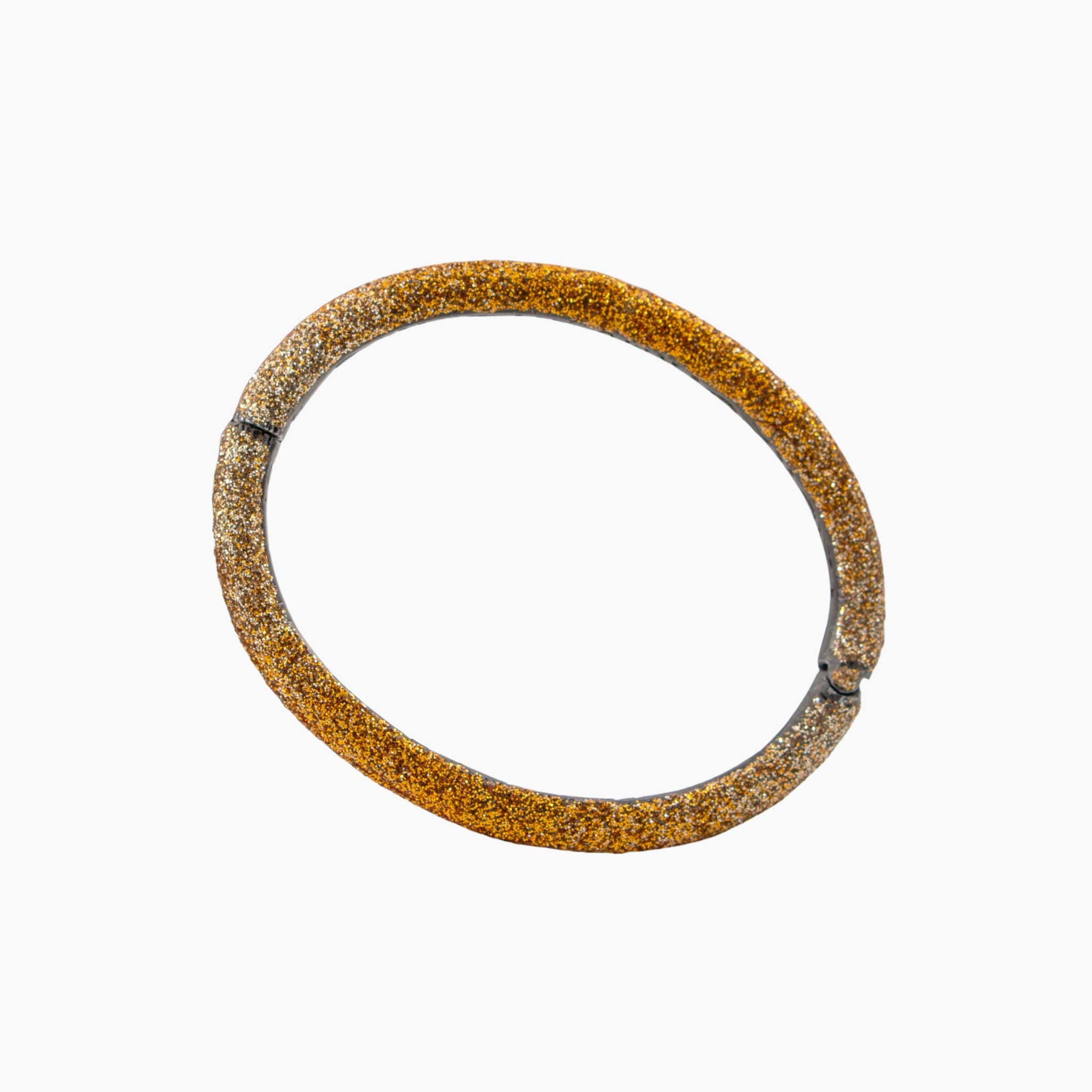 Round bracelet with textured surface on a white background