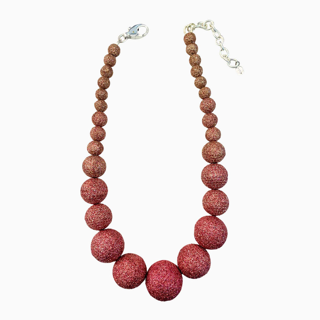Necklace with red beaded design on a white background