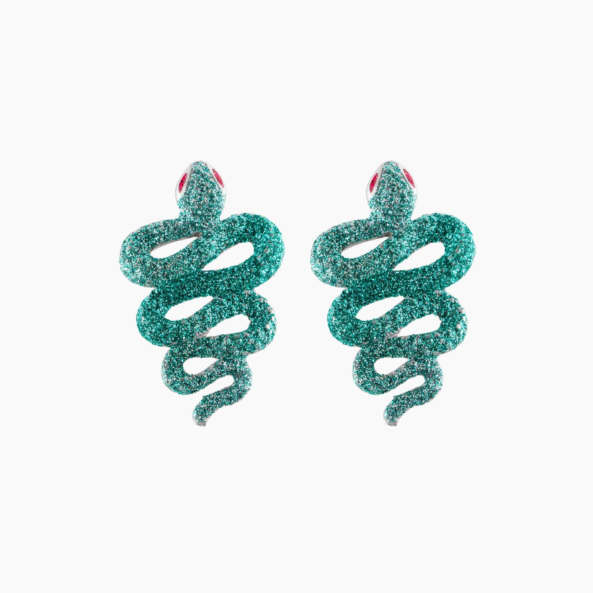Green glittery snake-shaped earrings on a white background