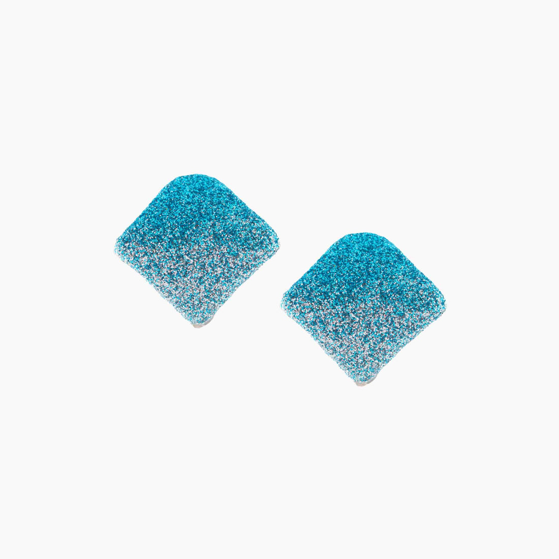 Two textured green and black earrings on a white background