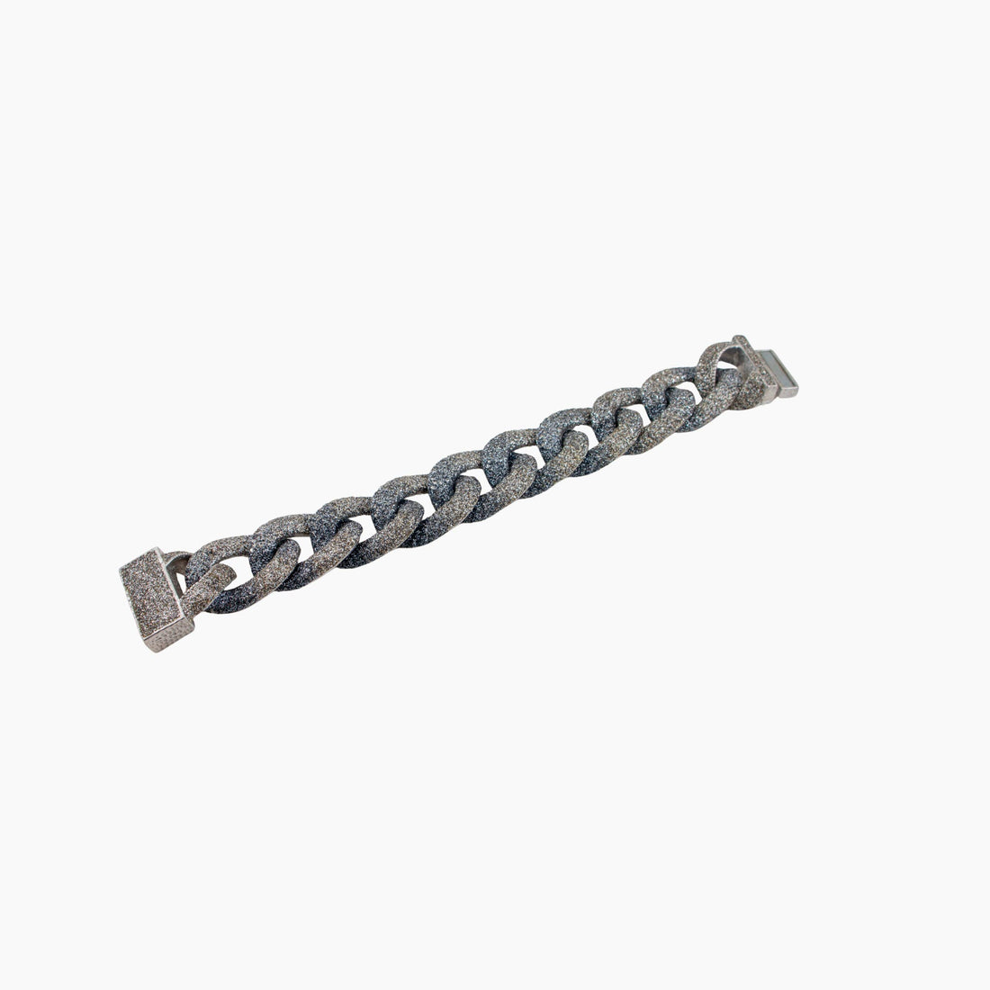 Chain bracelet with green and black links on a white background