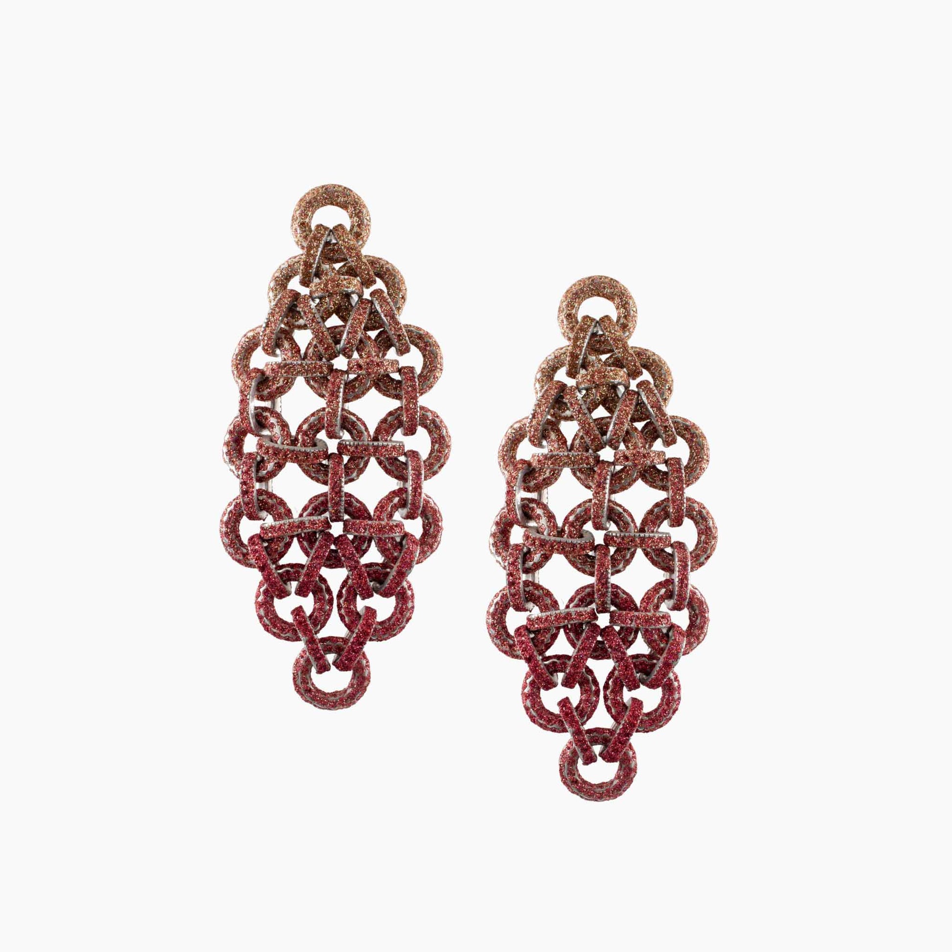 Pair of red chainmaille earrings on a white background