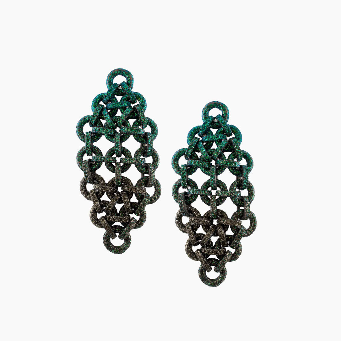 Pair of rust-colored chainmaille earrings on a white background