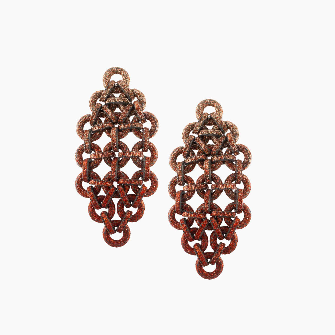 Pair of rust-colored chainmaille earrings on a white background