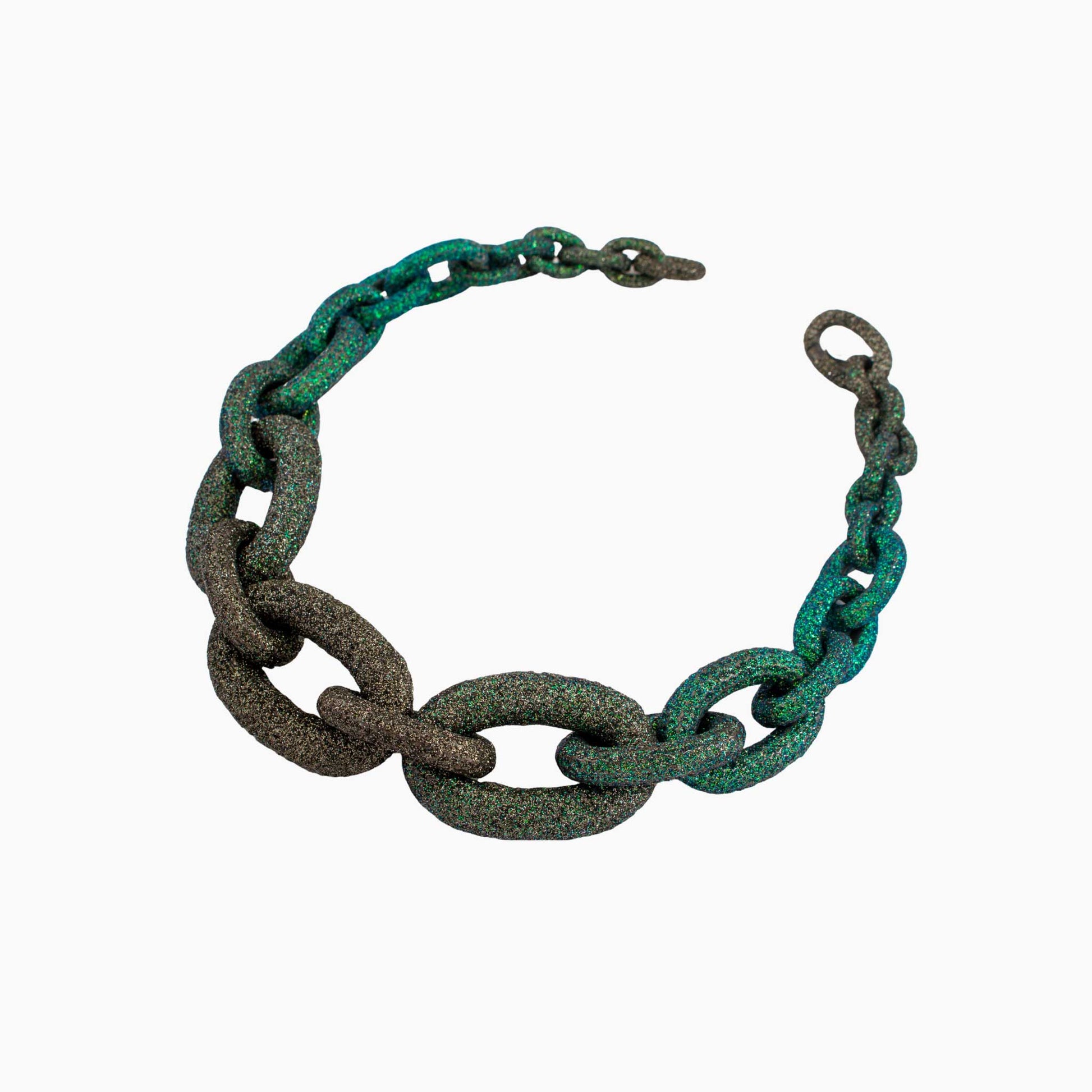 Chain necklace with green and brown on a white background