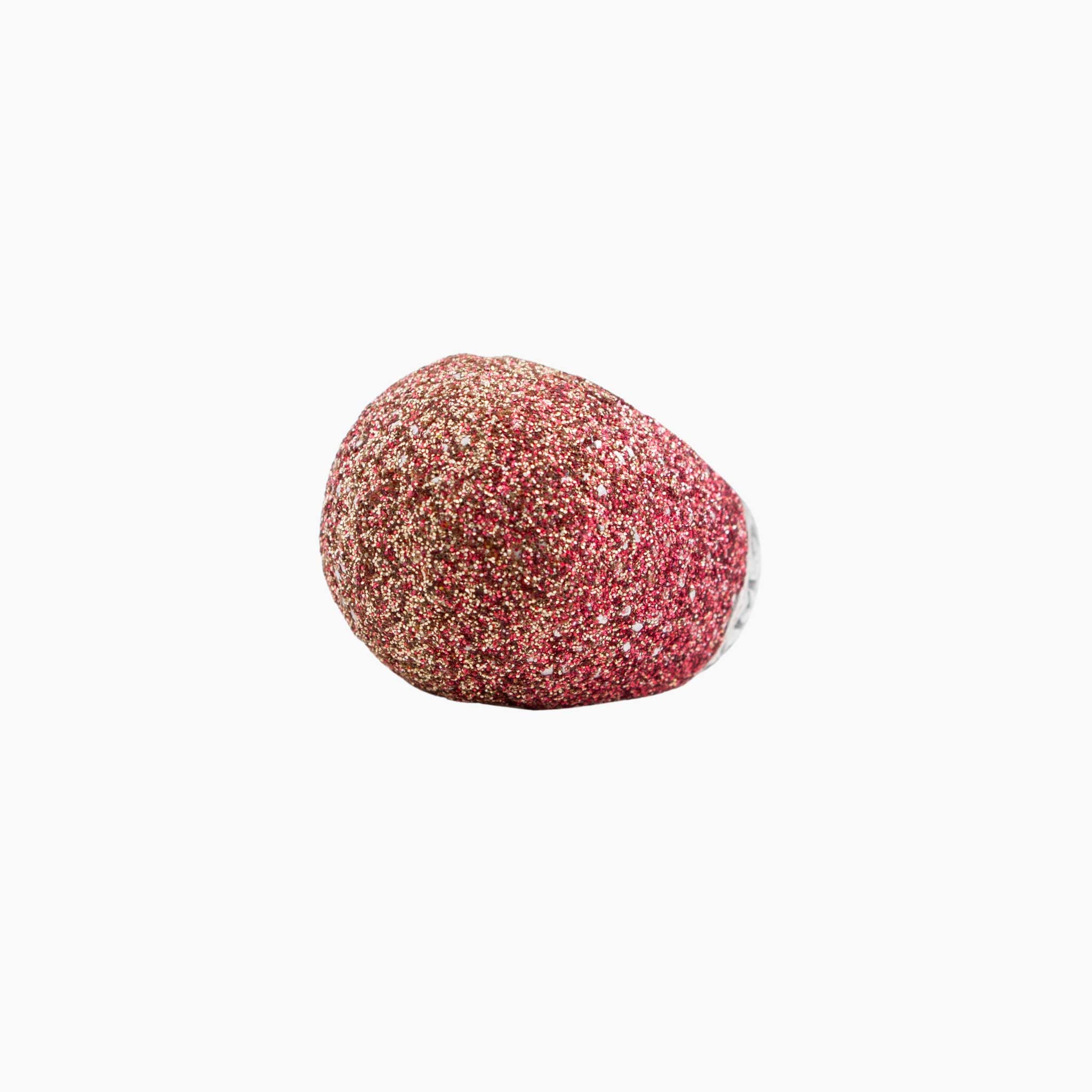 Red glittery ring on a white background