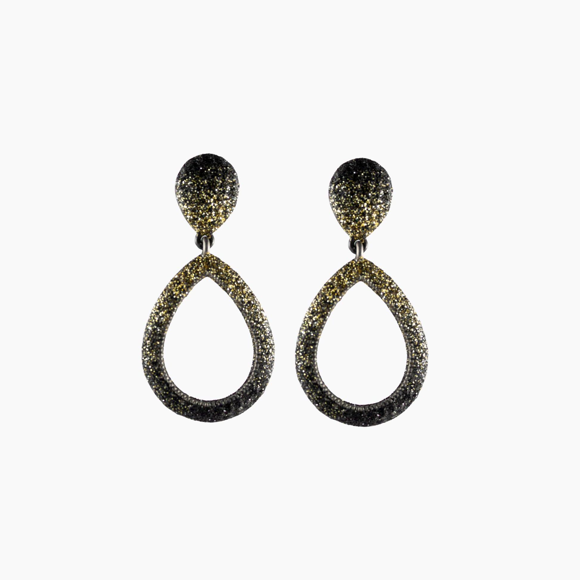 Pair of teardrop-shaped earrings with glittery finish on a white background