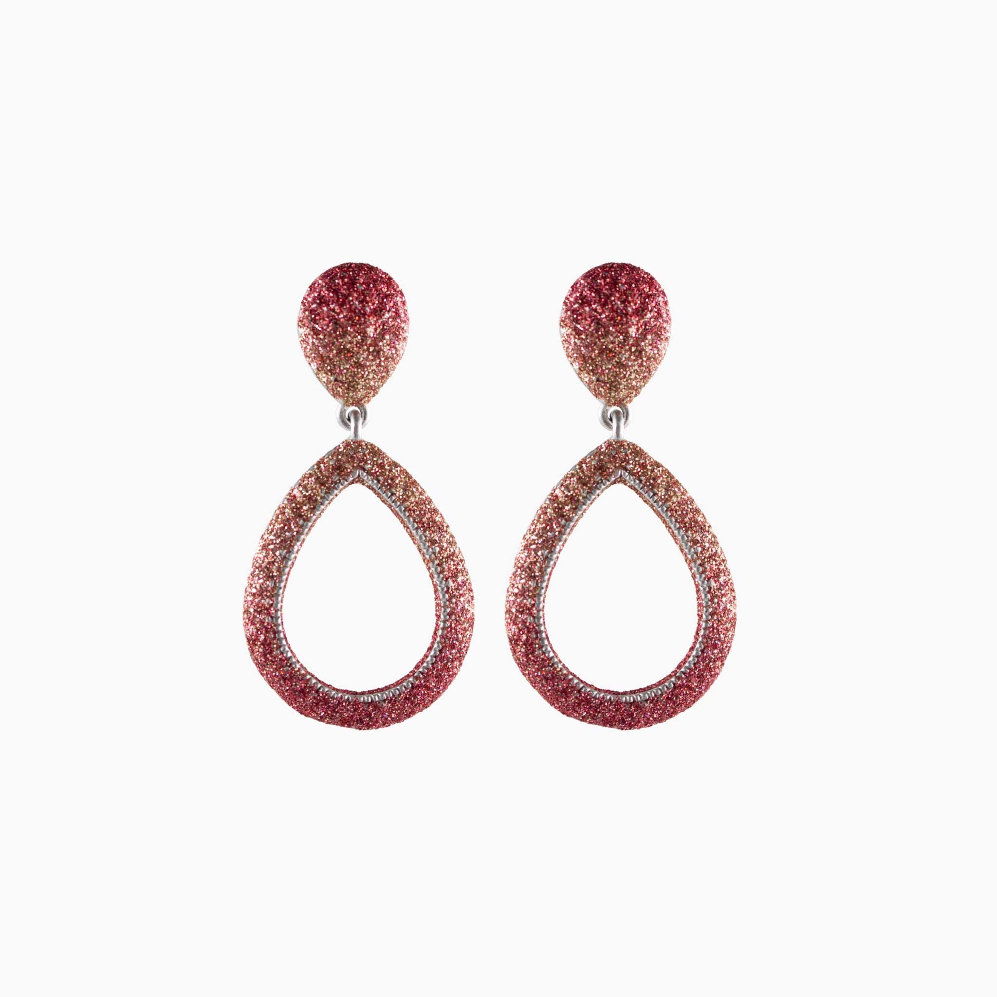 Pair of teardrop-shaped earrings with pink and gold gradient on a white background
