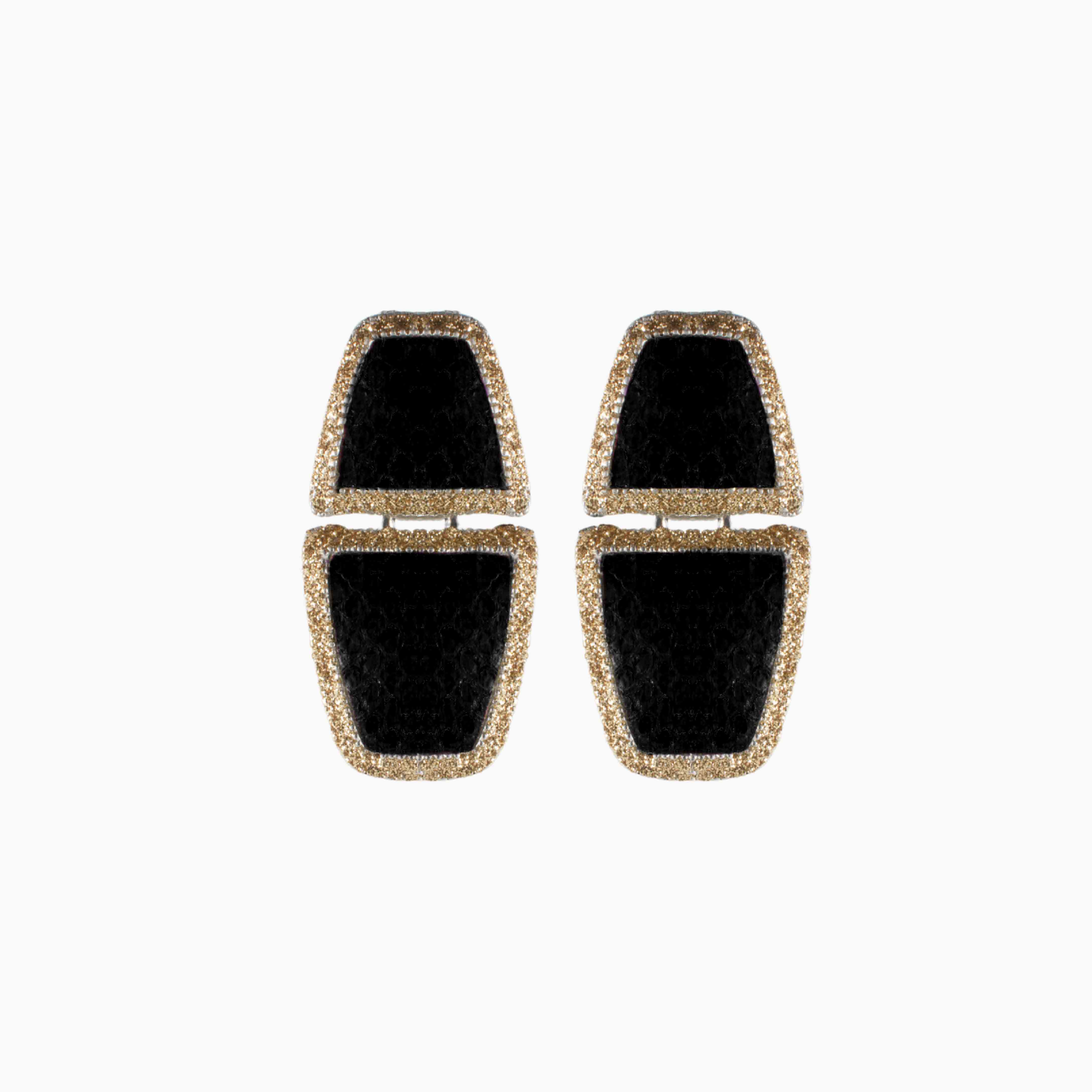 Pair of earrings with black and gold square design on a white background