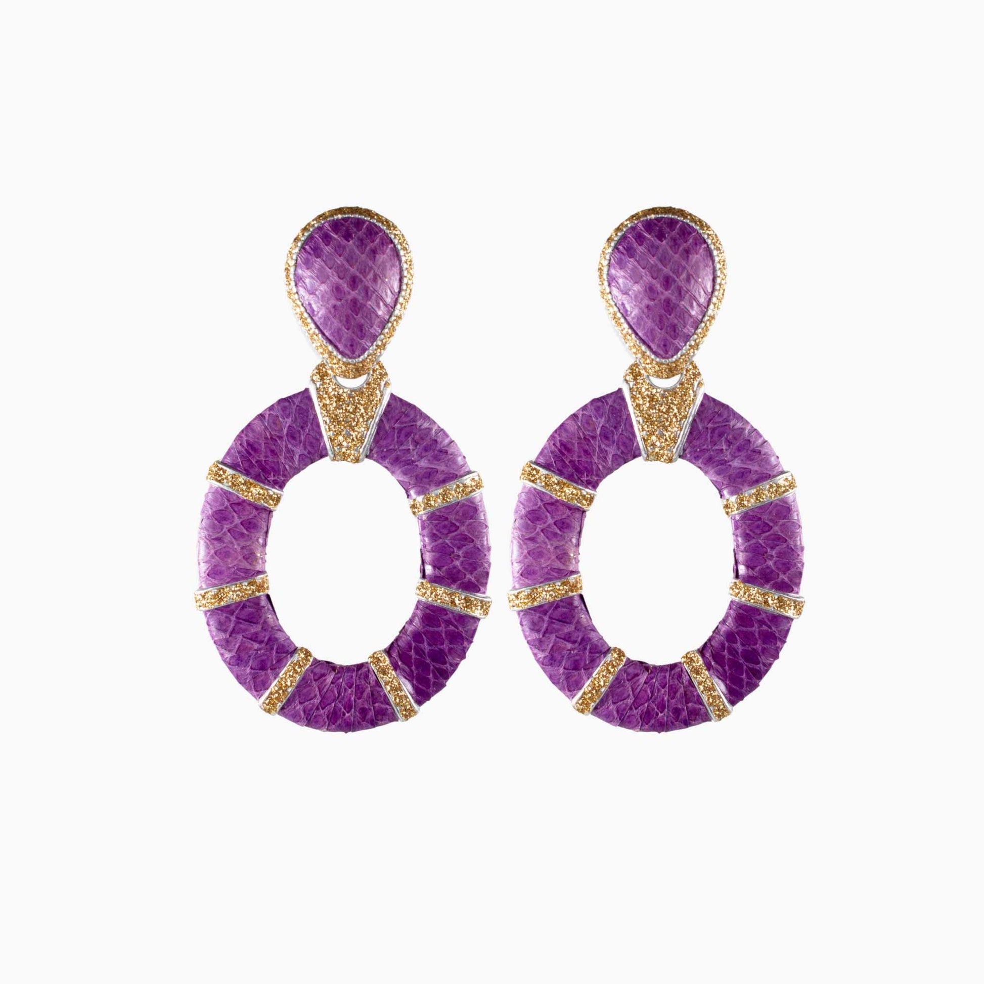 Purple earrings with gold accents on a white background
