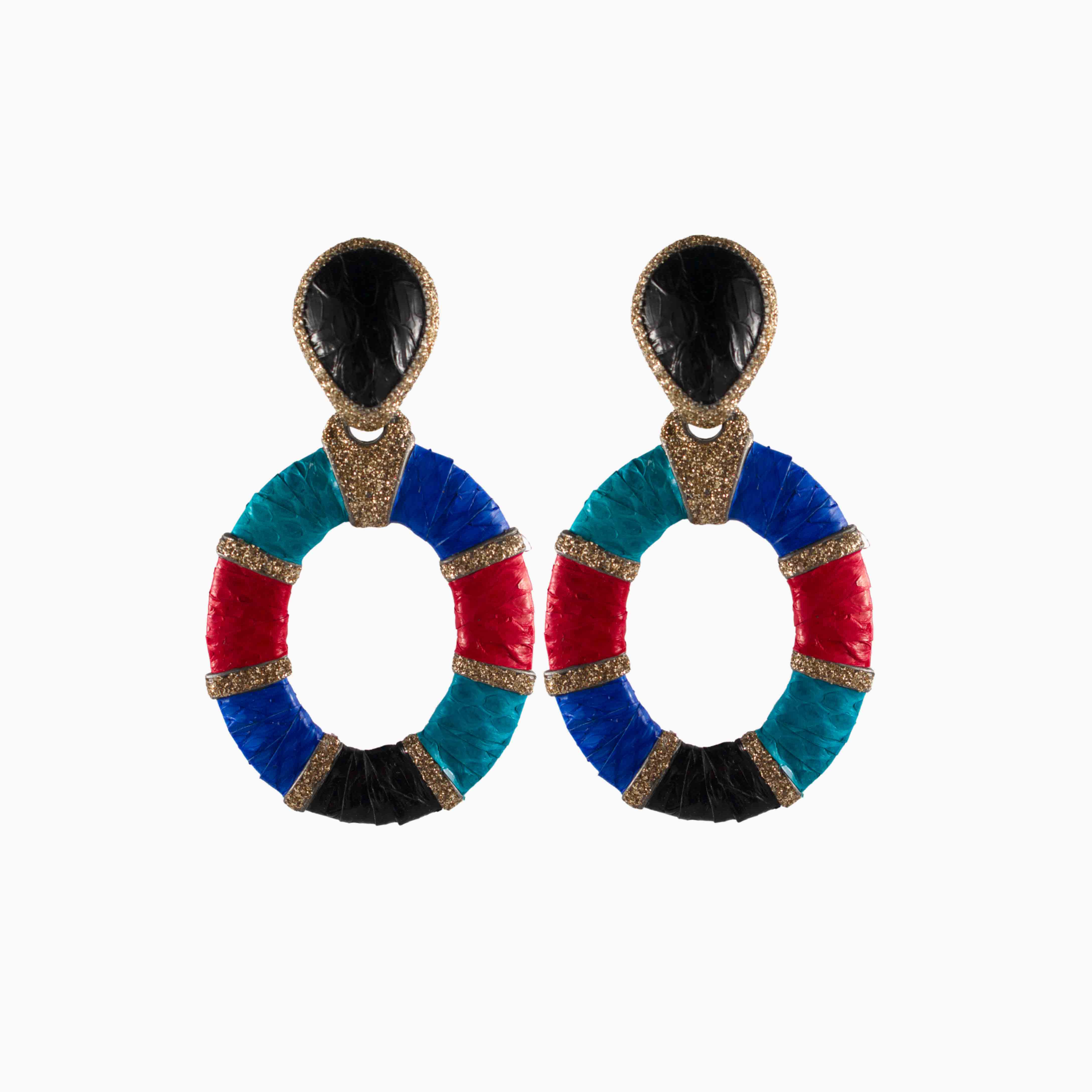 Colorful circular earrings with black centers on a white background