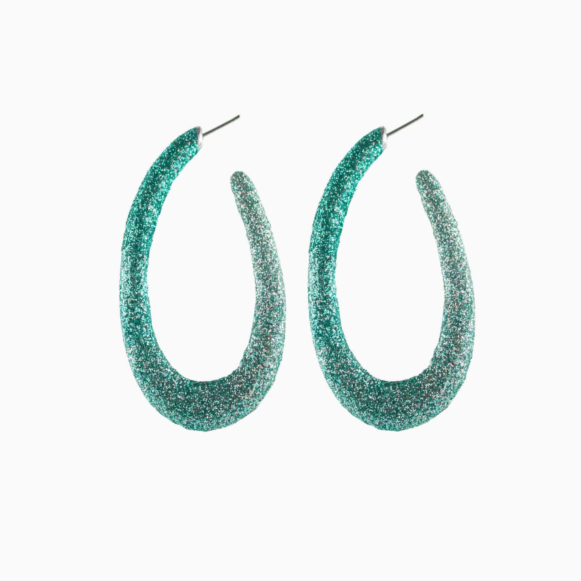 Teal glittery hoop earrings on a white background