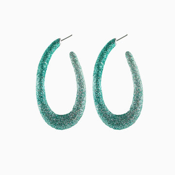 Teal glittery hoop earrings on a white background