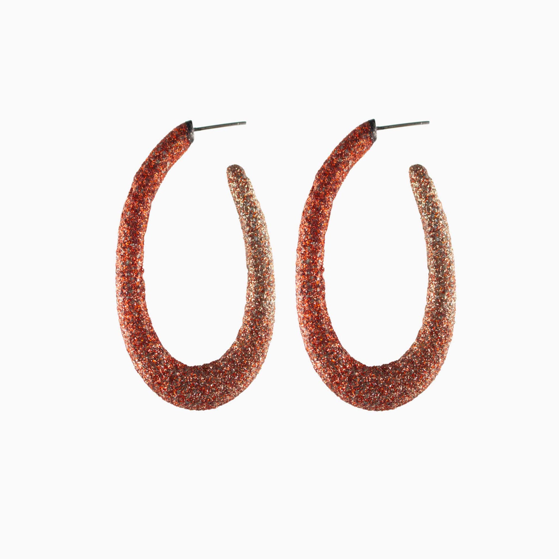 Pair of brown glittery hoop earrings on a white background
