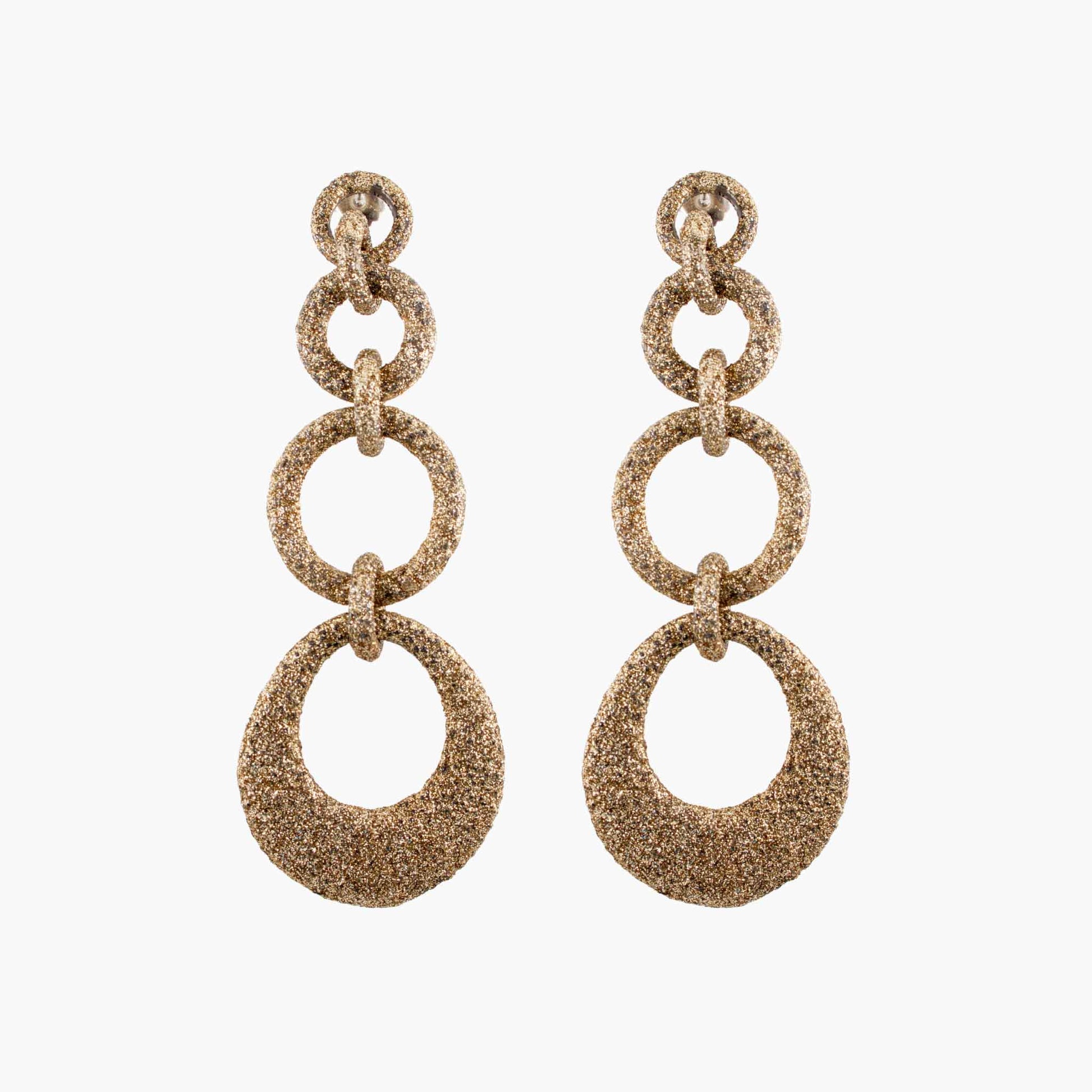 Pair of gold chain earrings on a white background