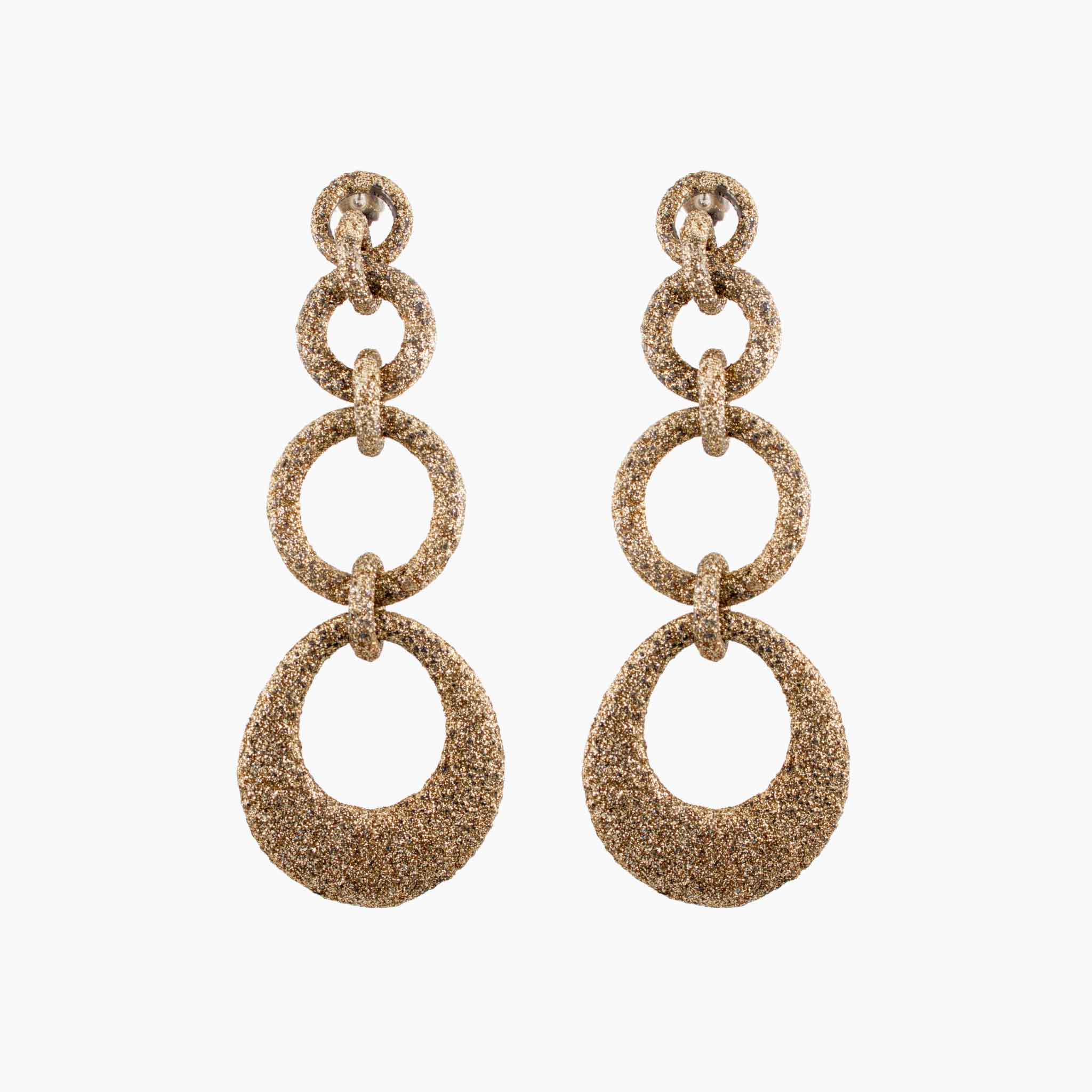 Pair of gold chain earrings on a white background
