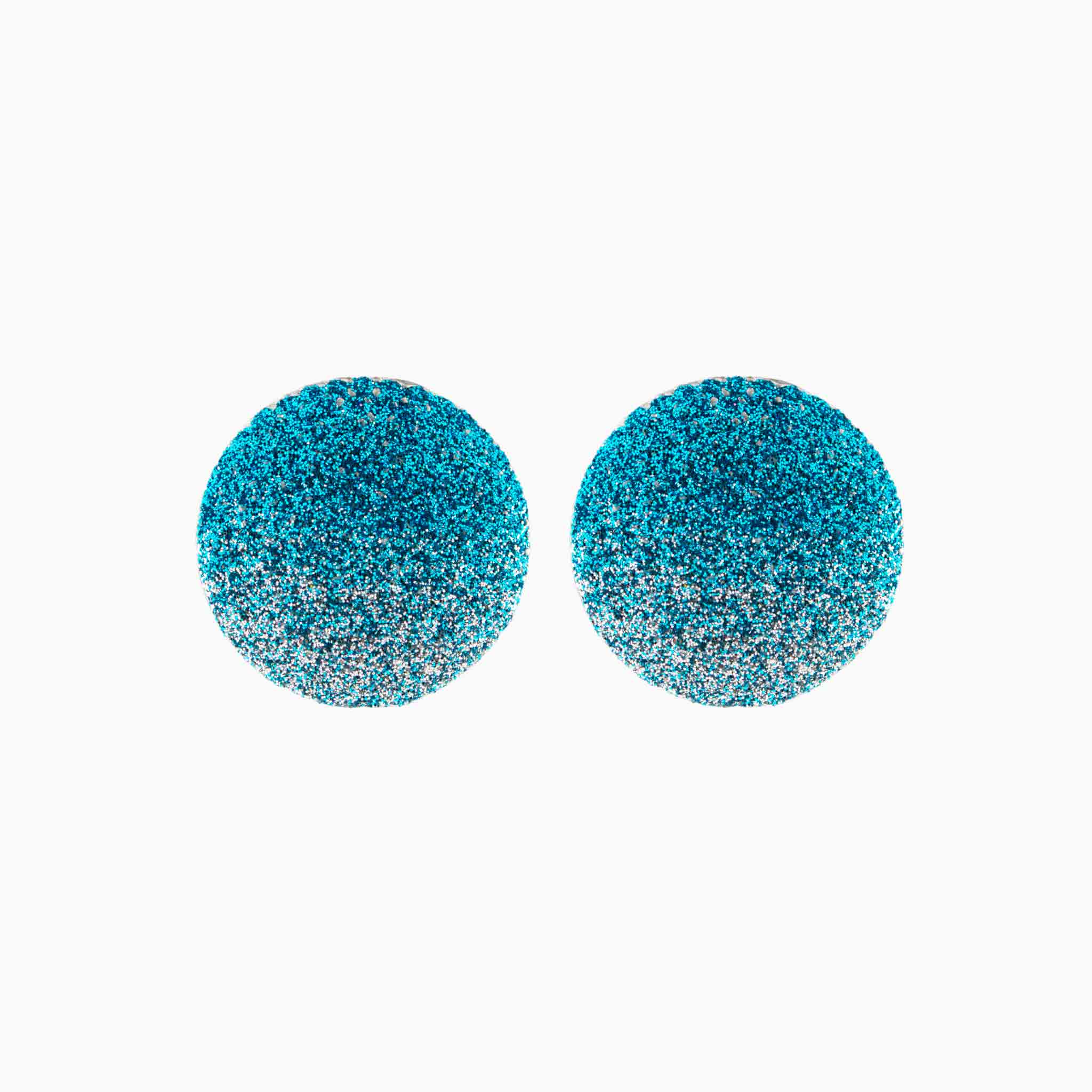 Pair of blue glittery round earrings on a white background
