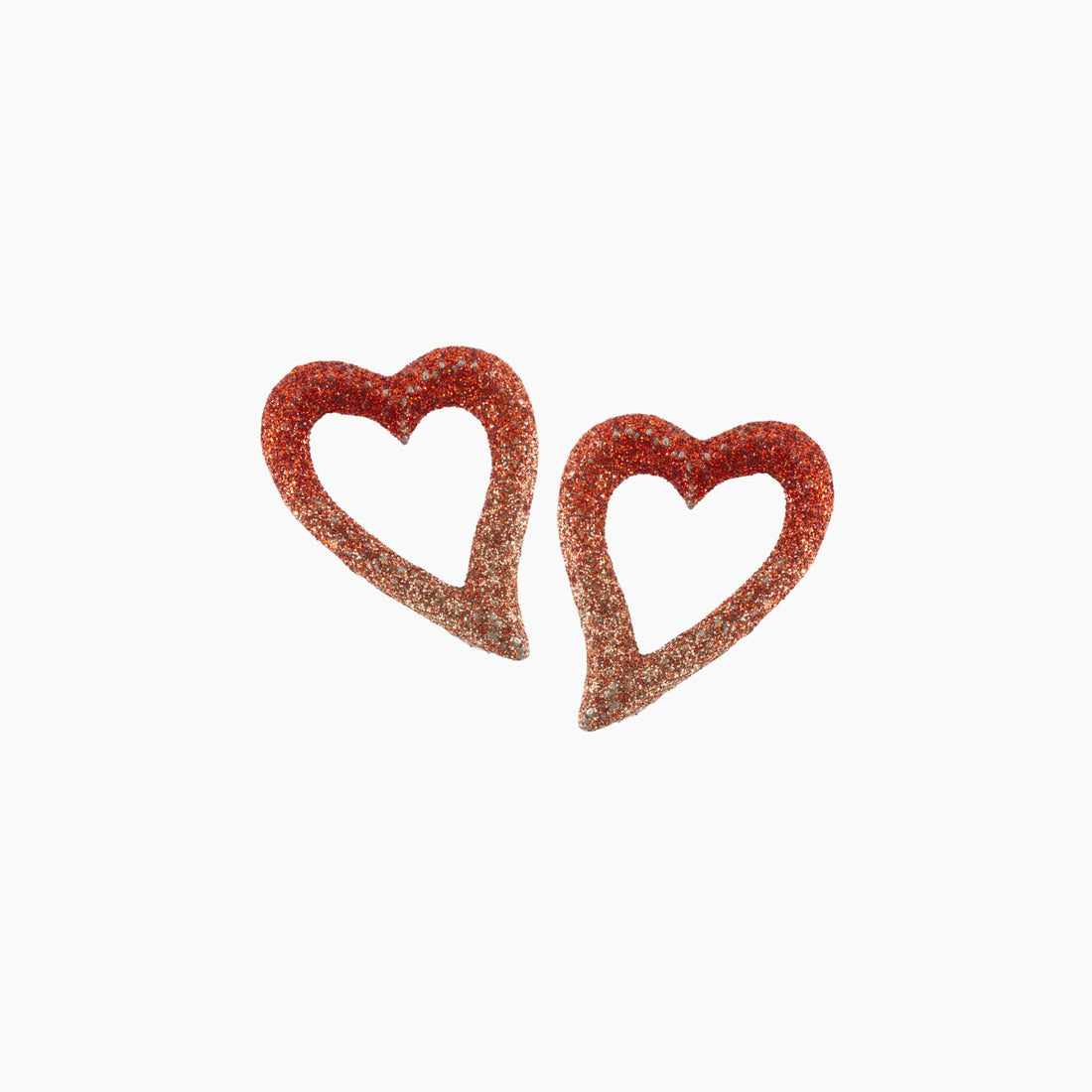 Heart-shaped earrings with a glittery finish on a white background