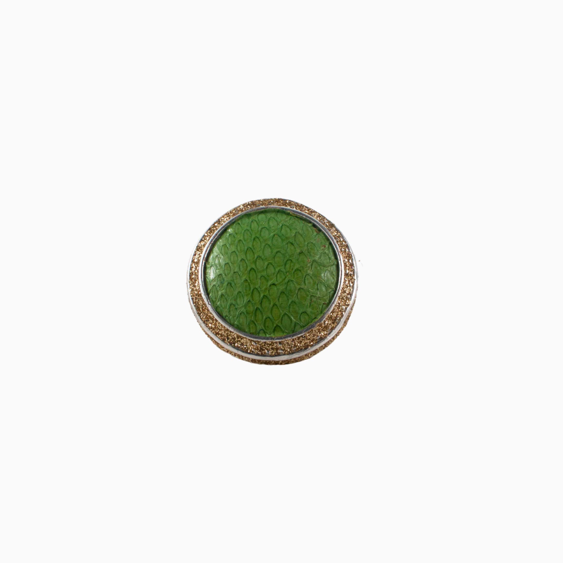 Round green ring with a textured surface on a white background