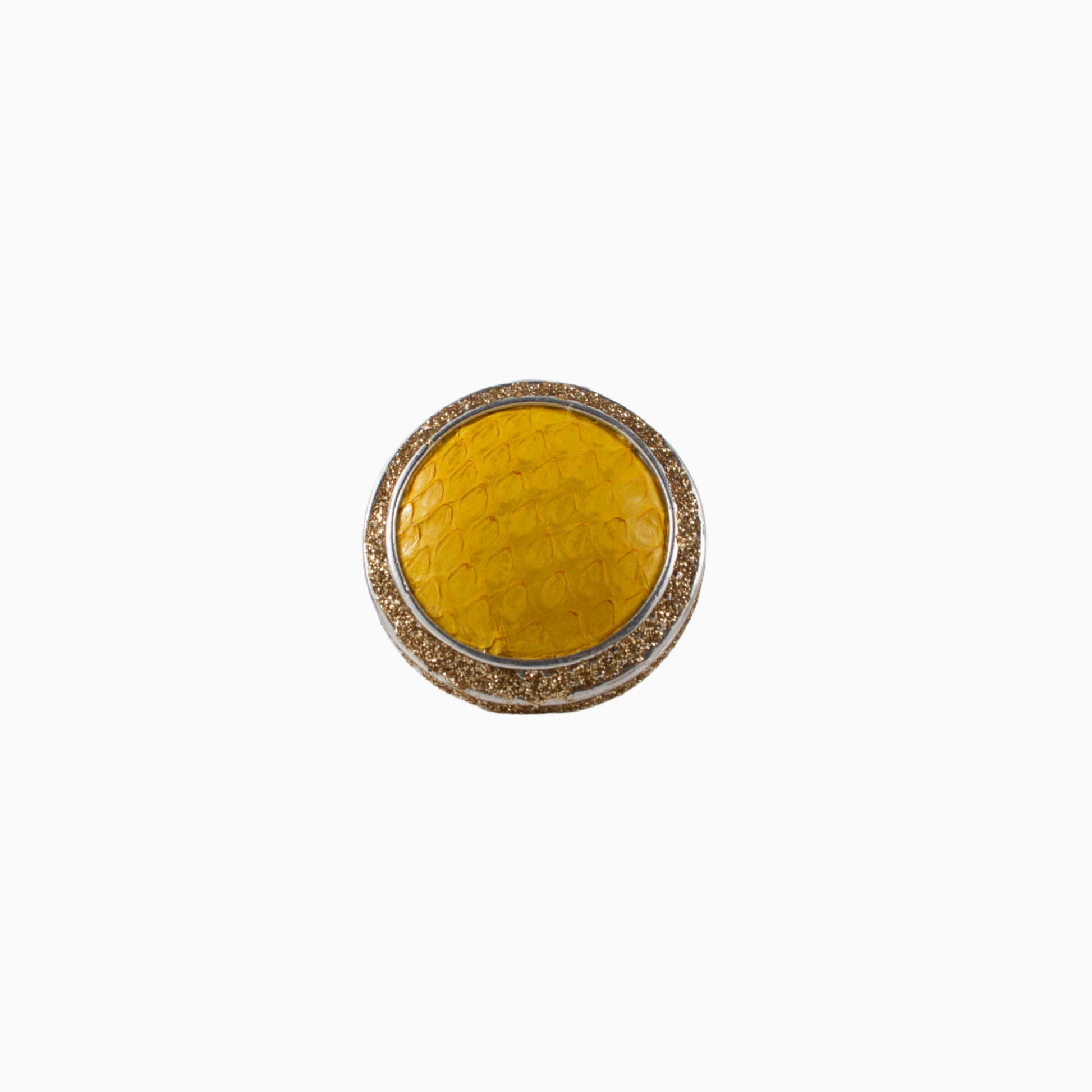 Round yellow ring with a textured surface on a white background