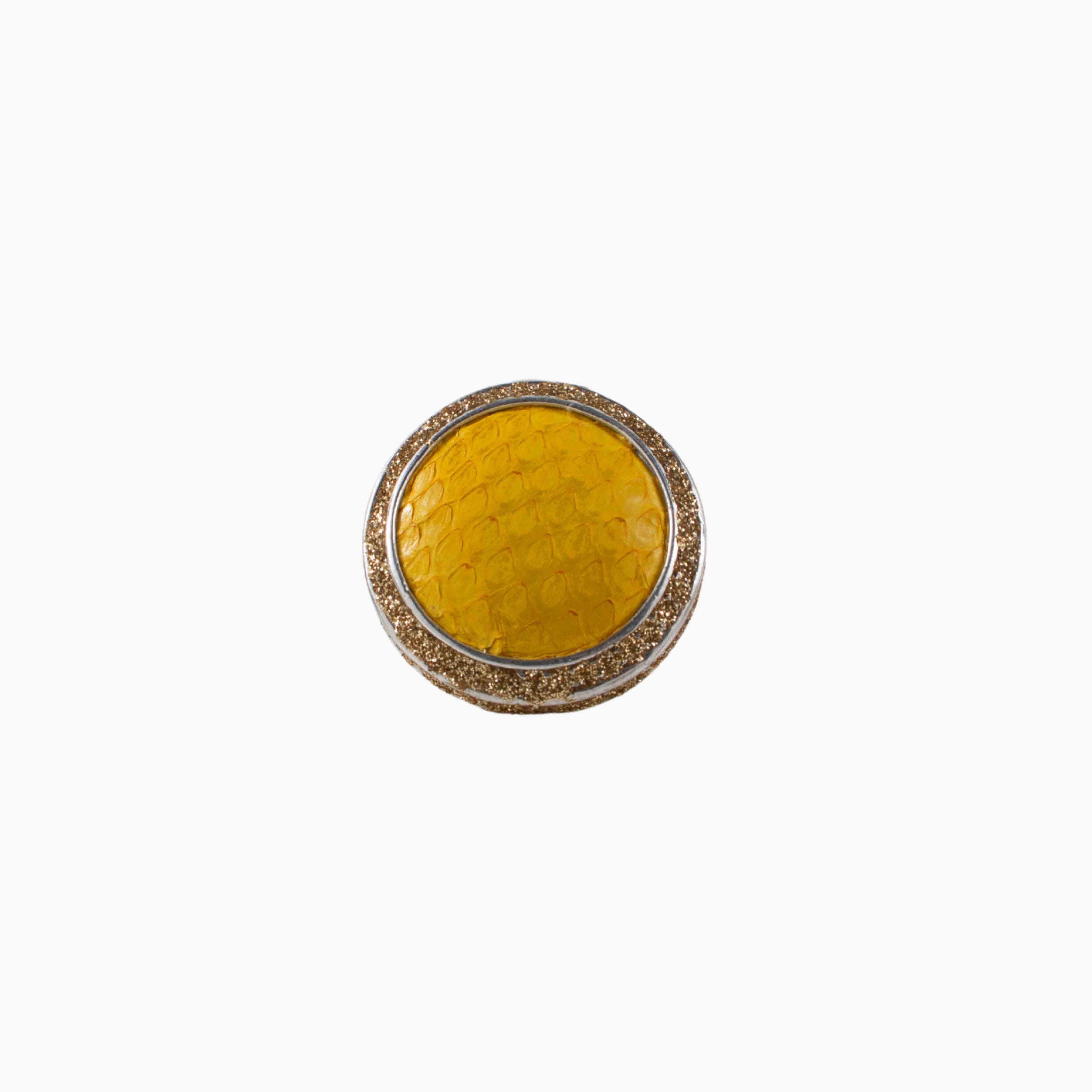 Round yellow ring with a textured surface on a white background