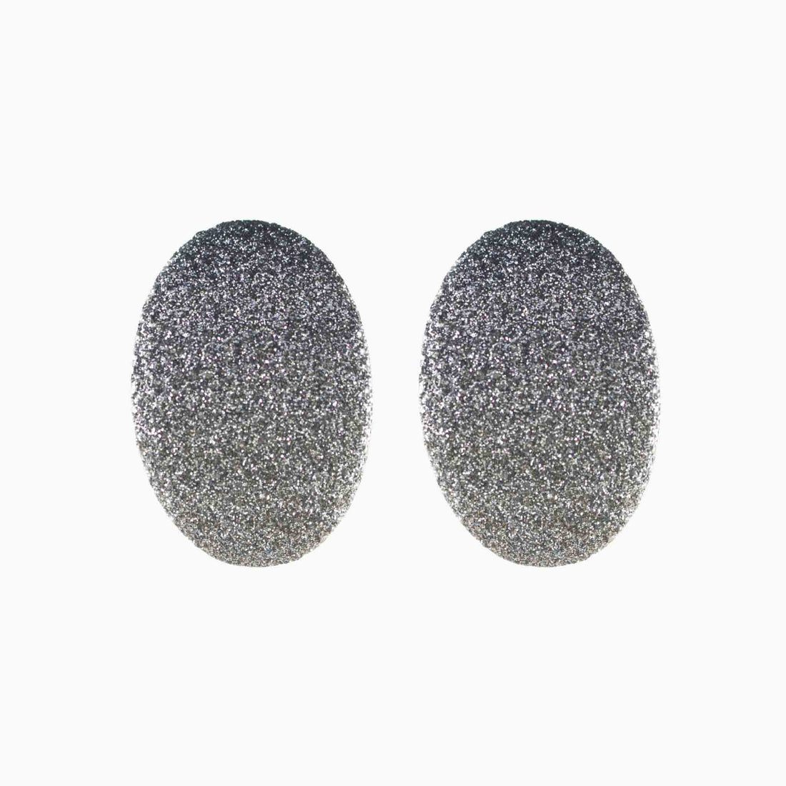 Pair of glittery pink and gold earrings on a white background