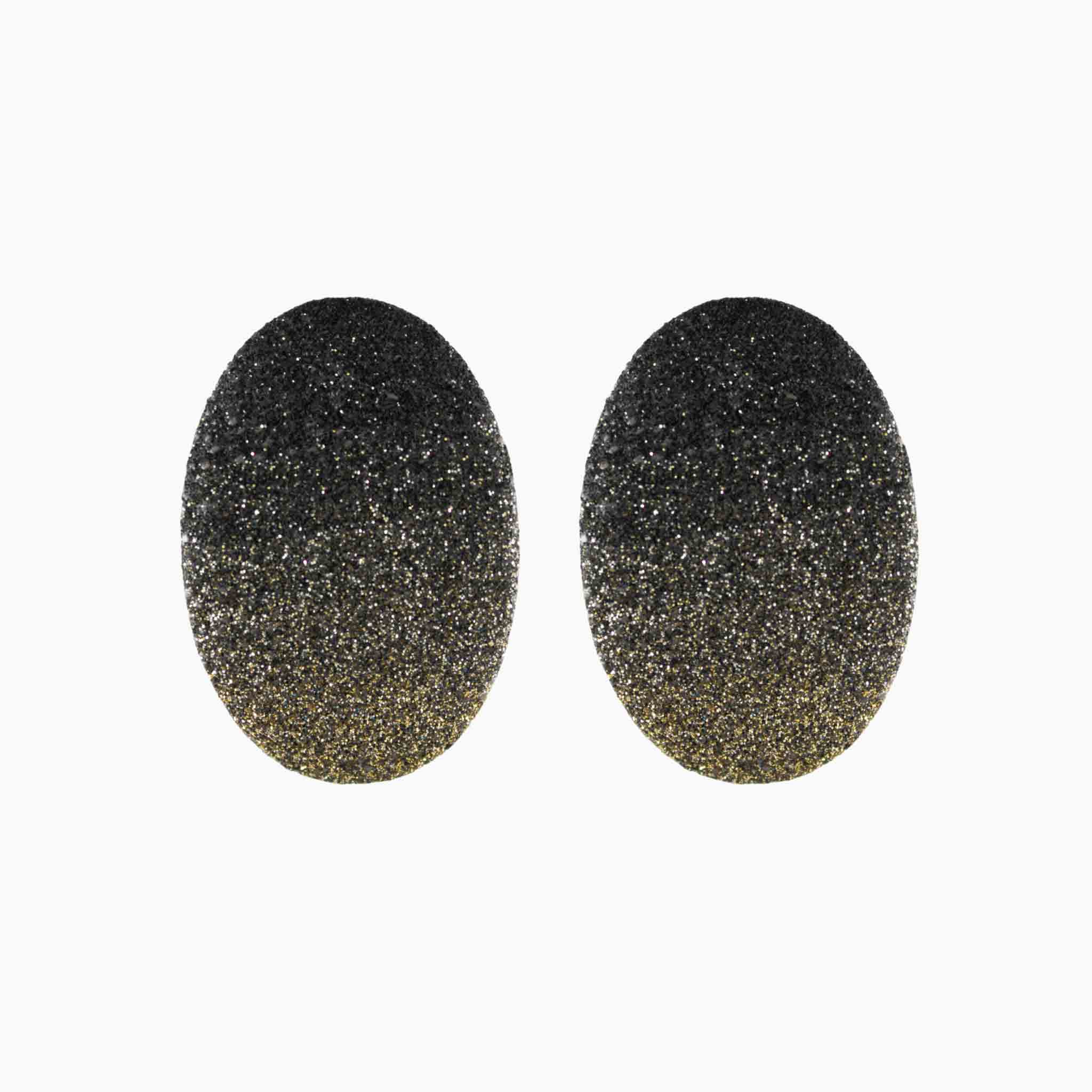 Pair of black glittery oval-shaped earrings on a white background