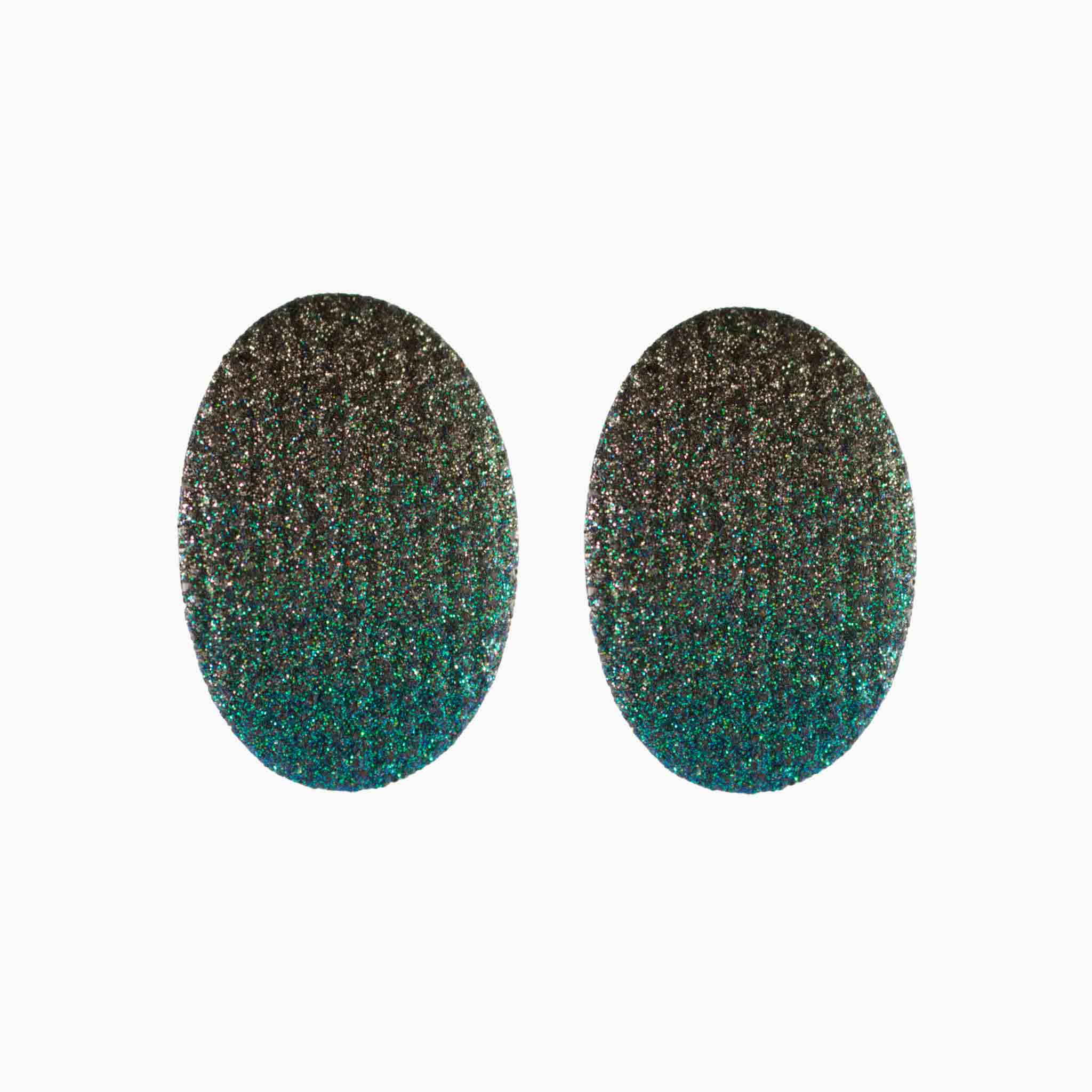Pair of glittery green oval earrings on a white background