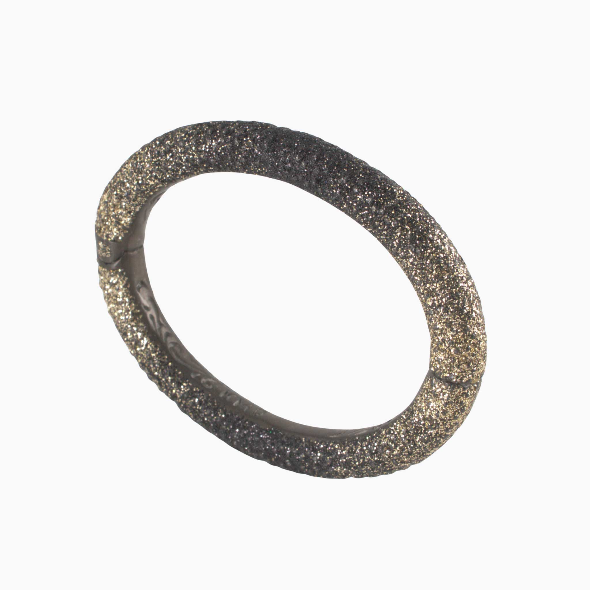 Round metallic bracelet on a white background