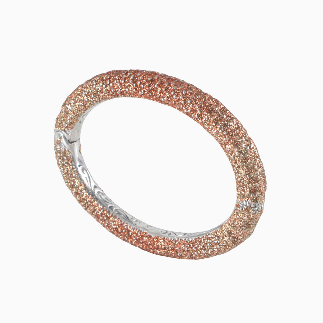 Silver bracelet with glittery band on a white background