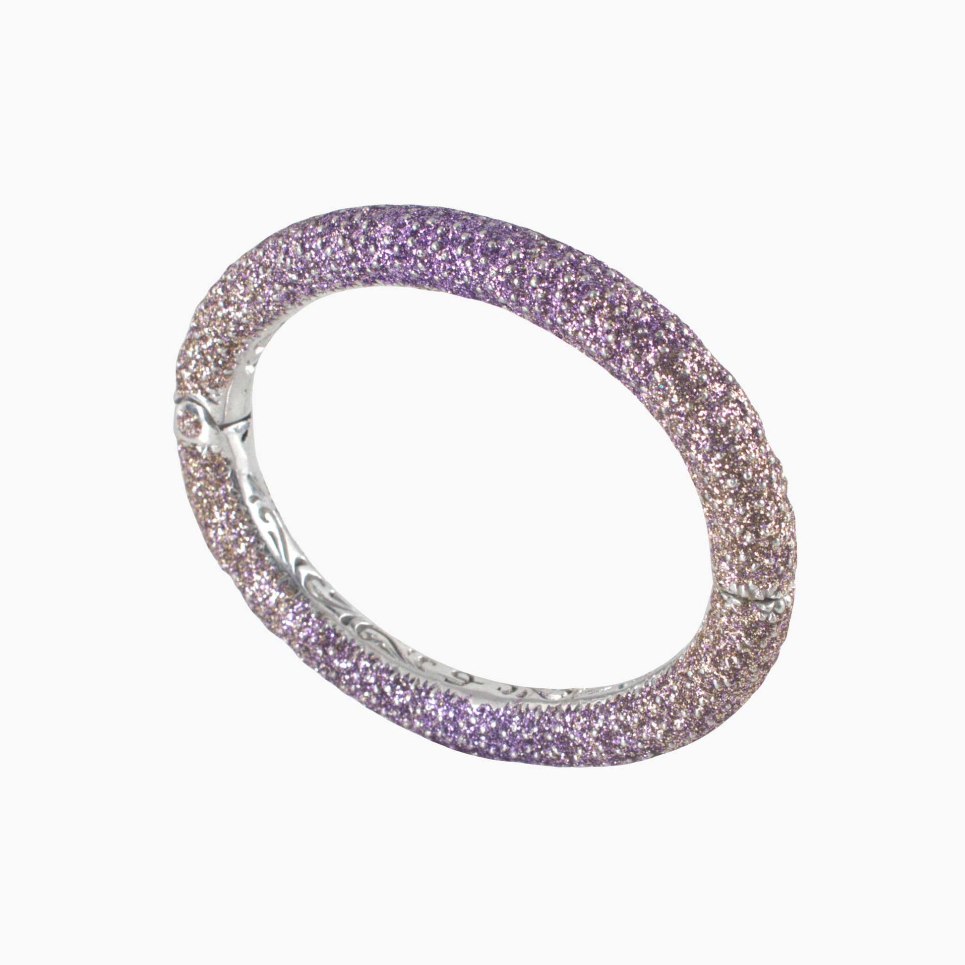 Multicolored glittery bracelet on a white background