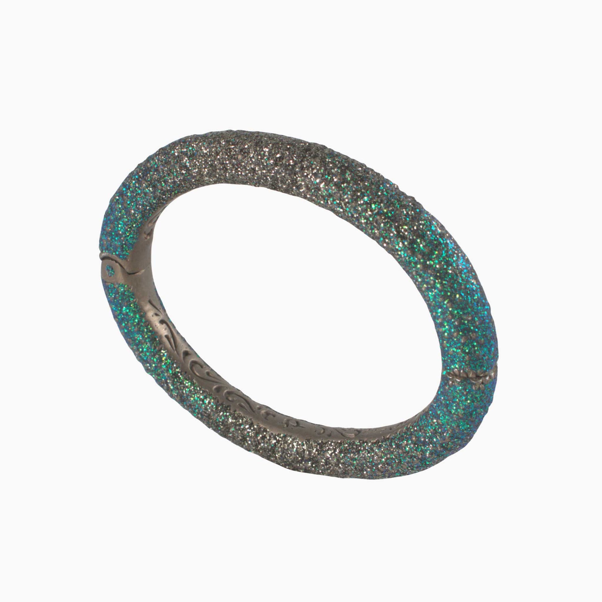 Bangle with glittery texture on a white background