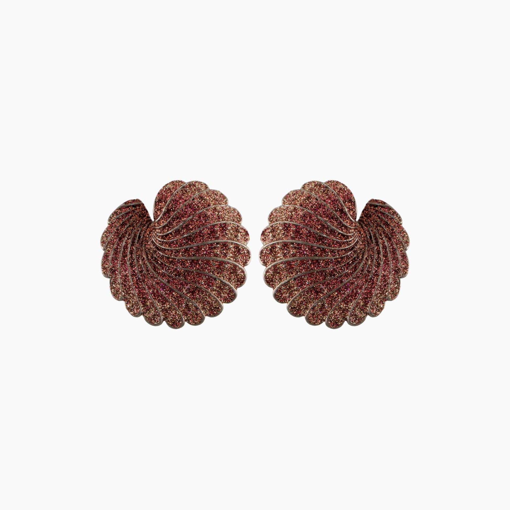 Pair of shell earrings on a white background