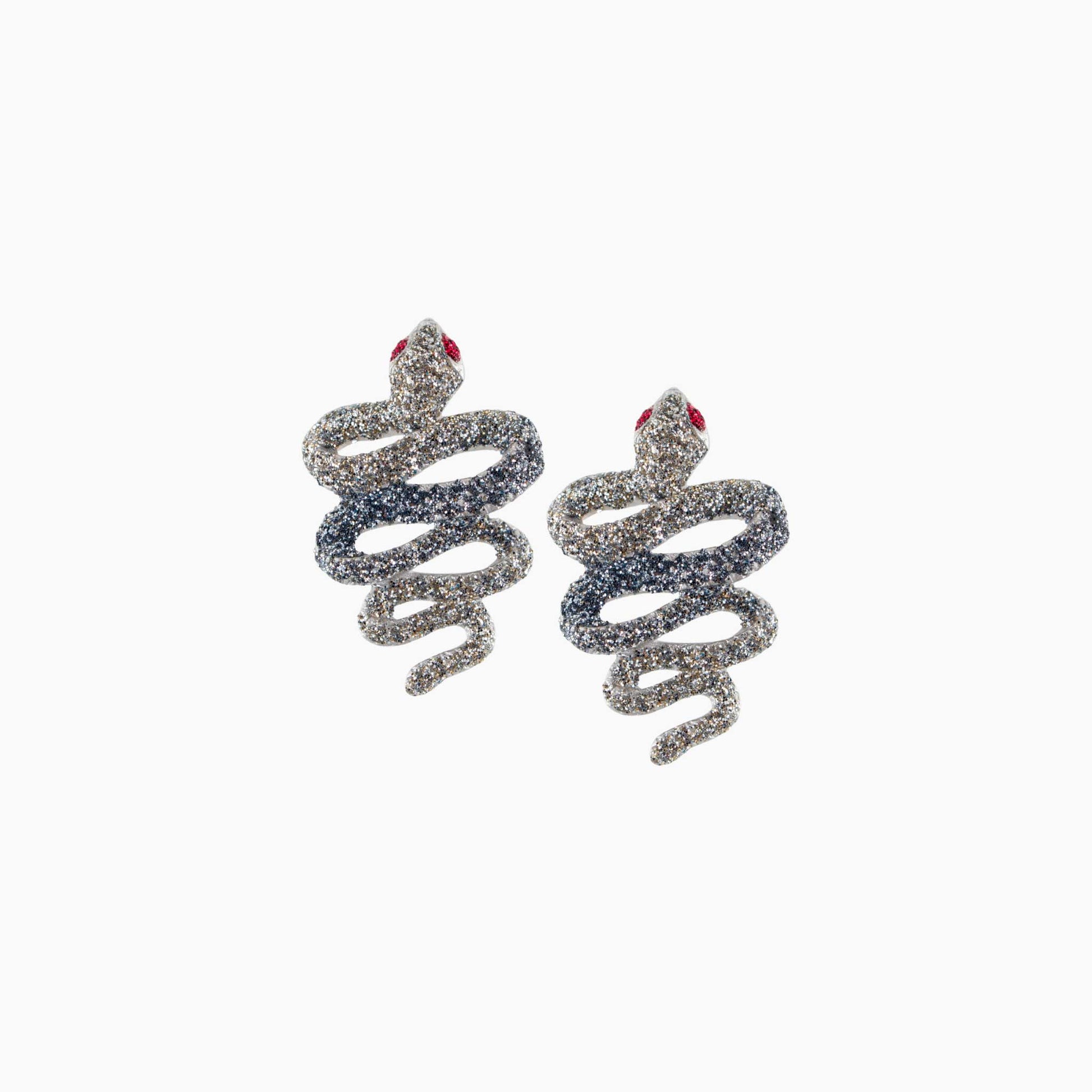 Serpentine earrings with red accents on a white background