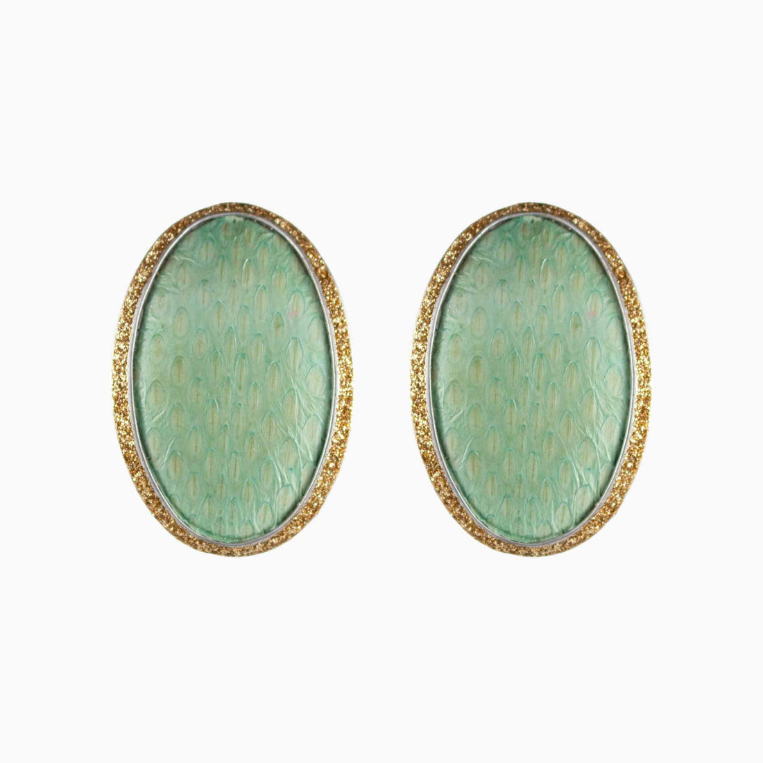 Pair of earrings with blue textured centers and gold borders on a white background