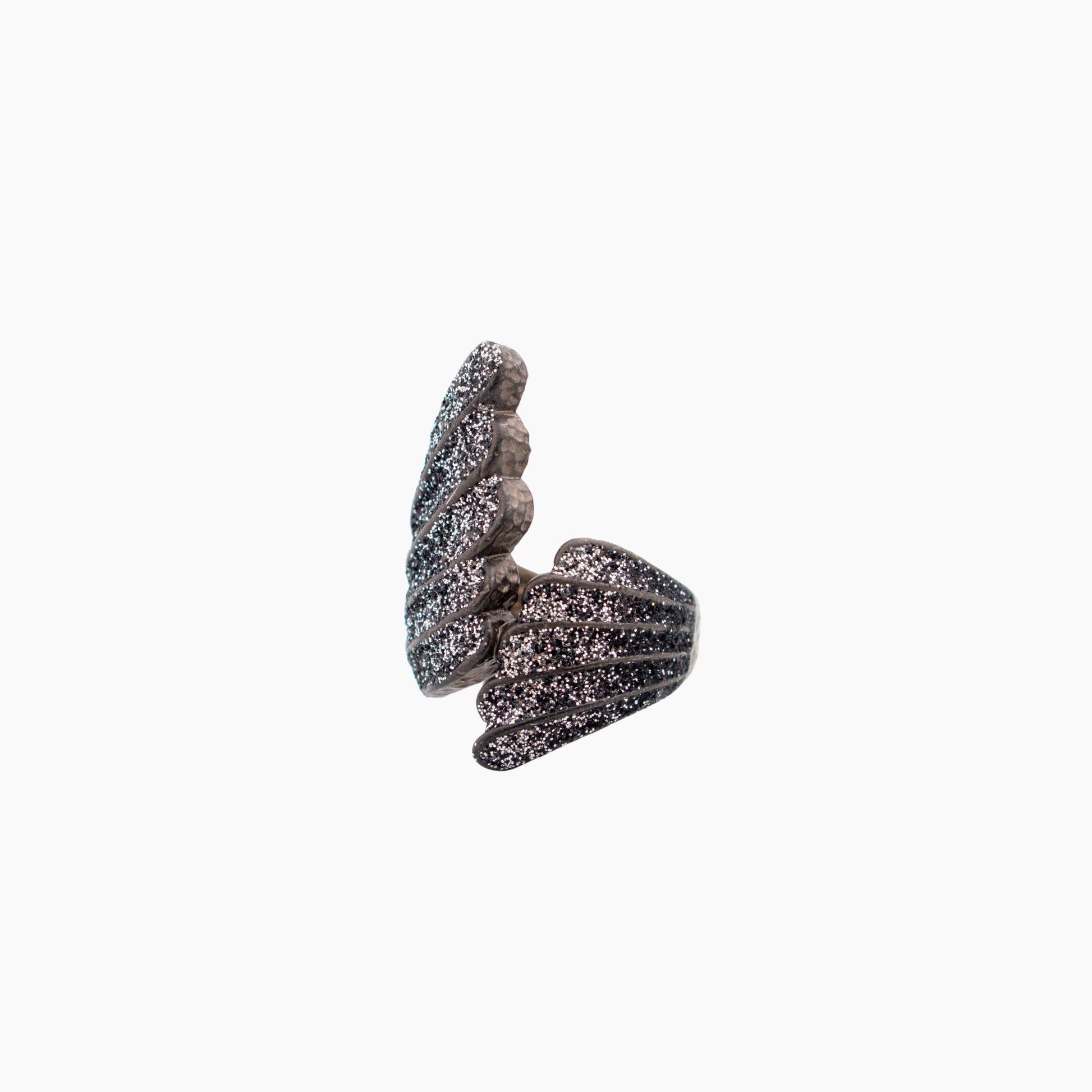 Decorative ring sculpture on a white background